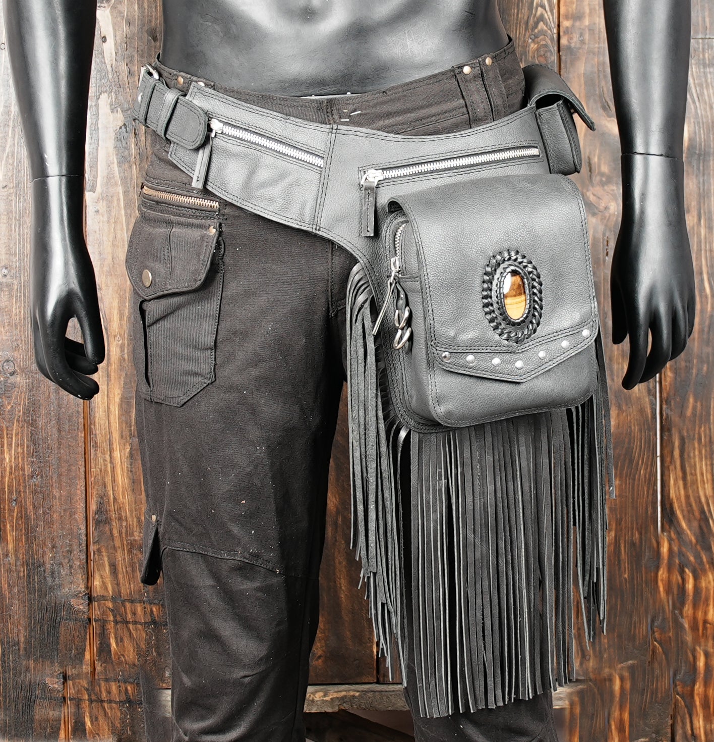 Western-inspired leather hip bag with gemstone detailing