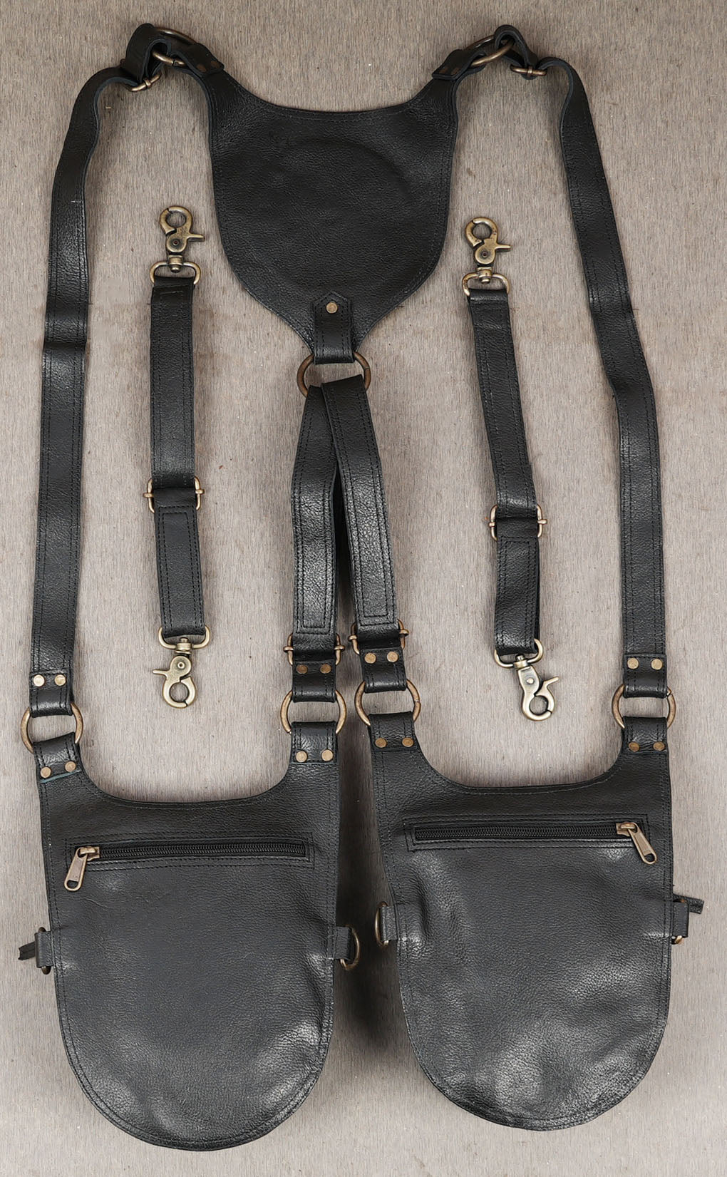 Decorative leather holster harness with sun pattern design