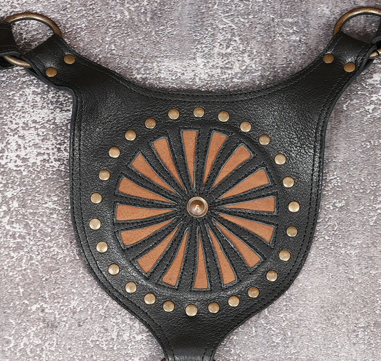 Steampunk leather shoulder harness with sunburst detailing