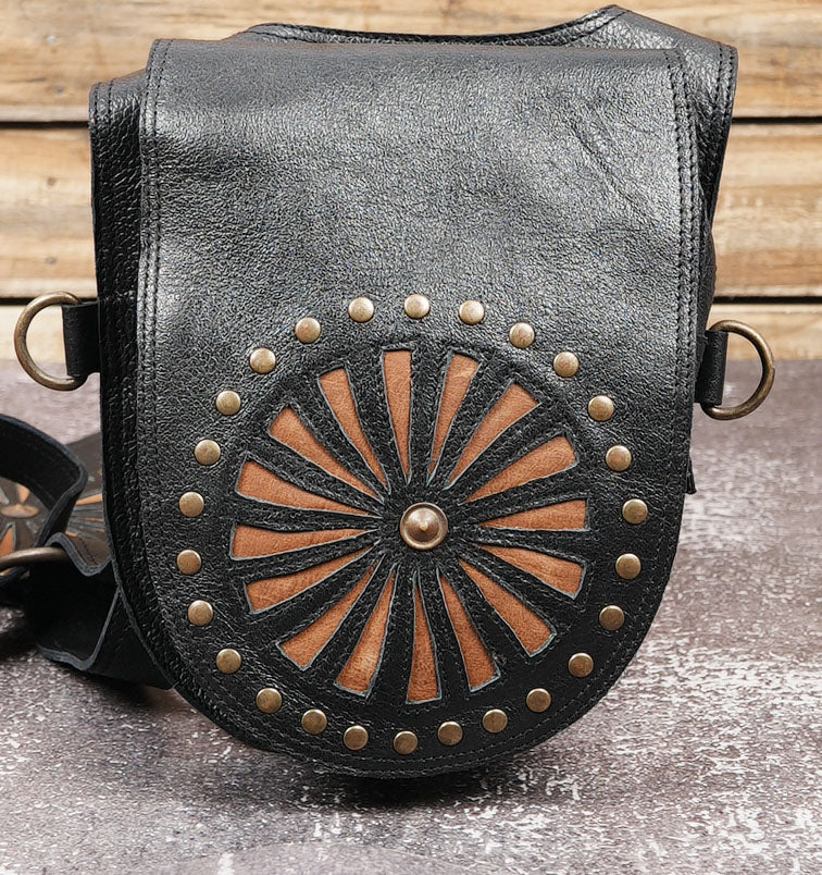 Festival leather holster harness with detailed rivet accents