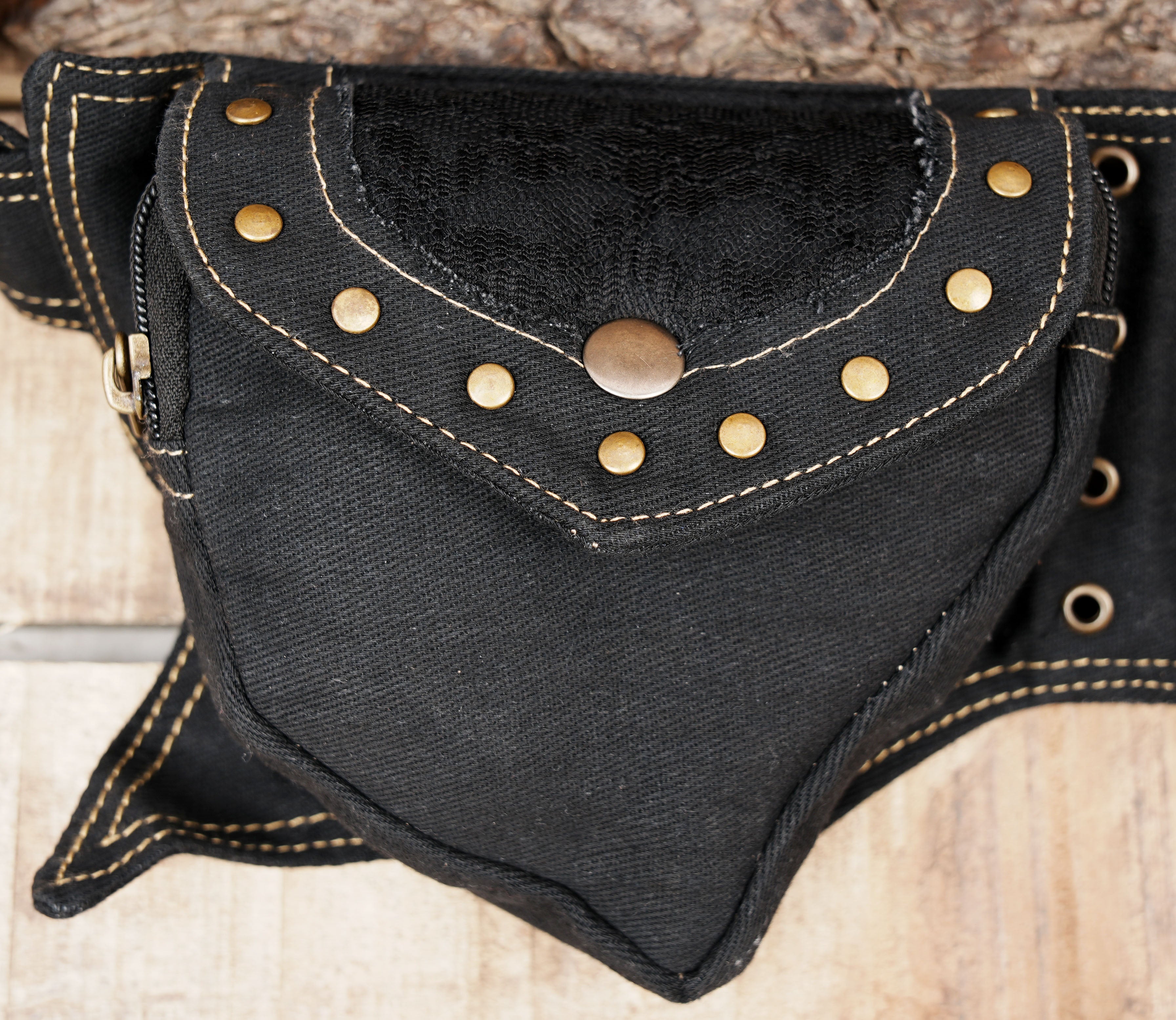 Pixie pocket belt in heavy cotton canvas with brass dome studs and grommets