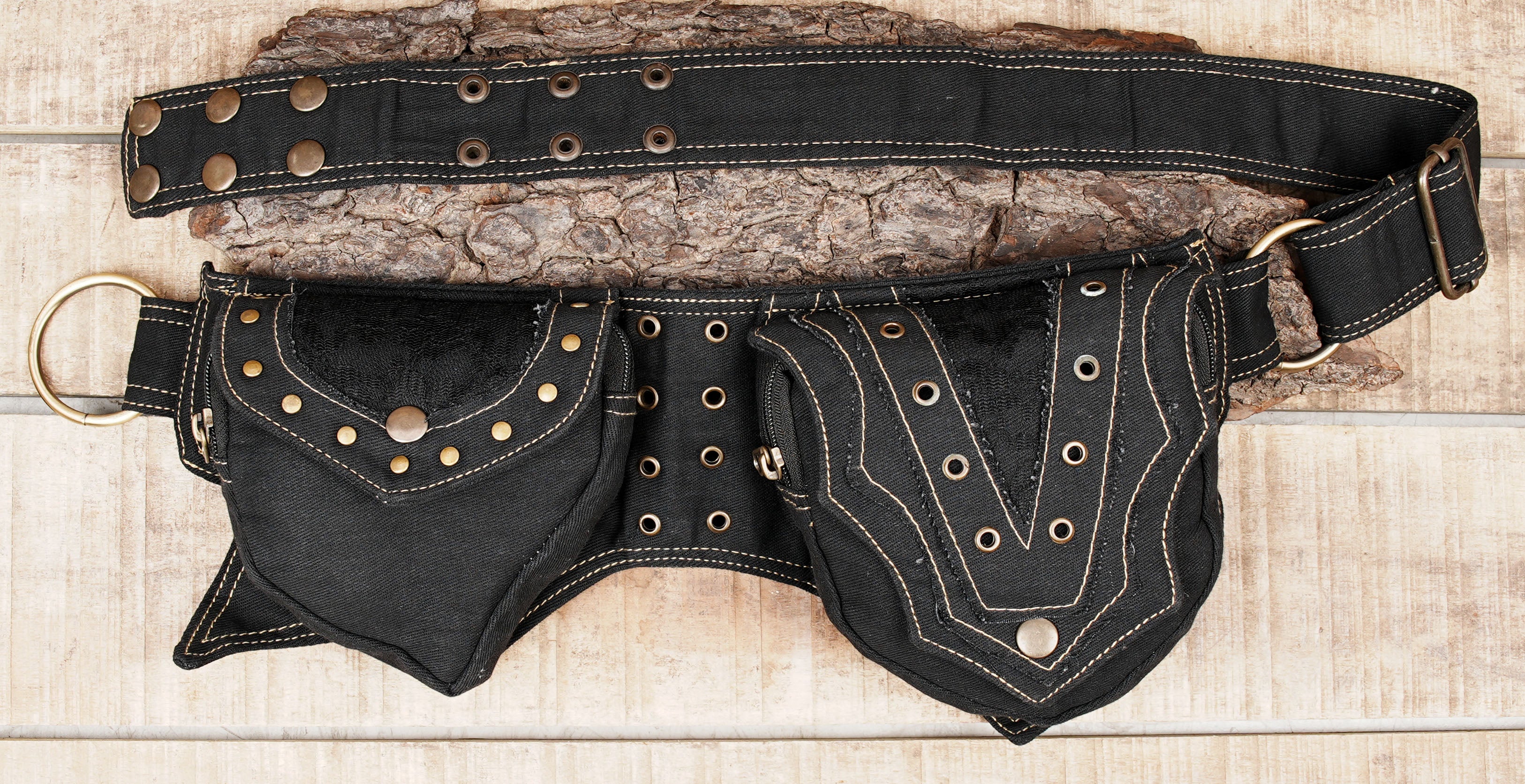 Burning man utility belt with asymmetric cargo pouches and dome rivets
