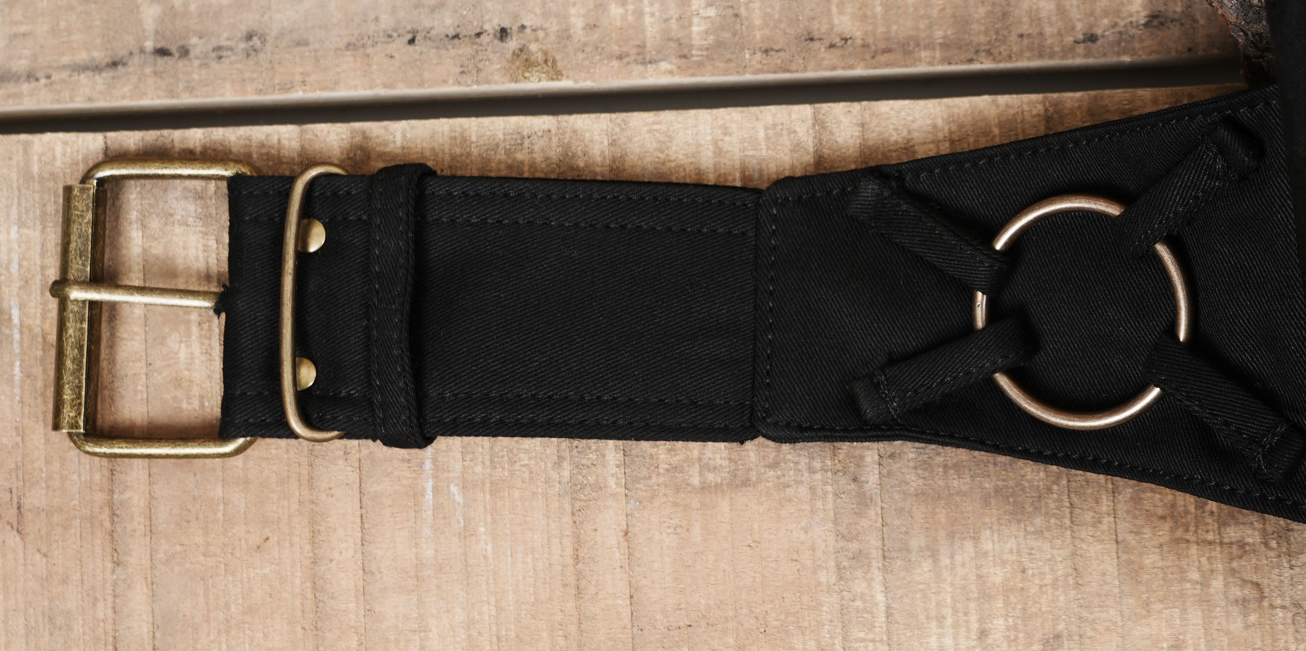 Unisex black canvas fanny pack with tactical buckle details
