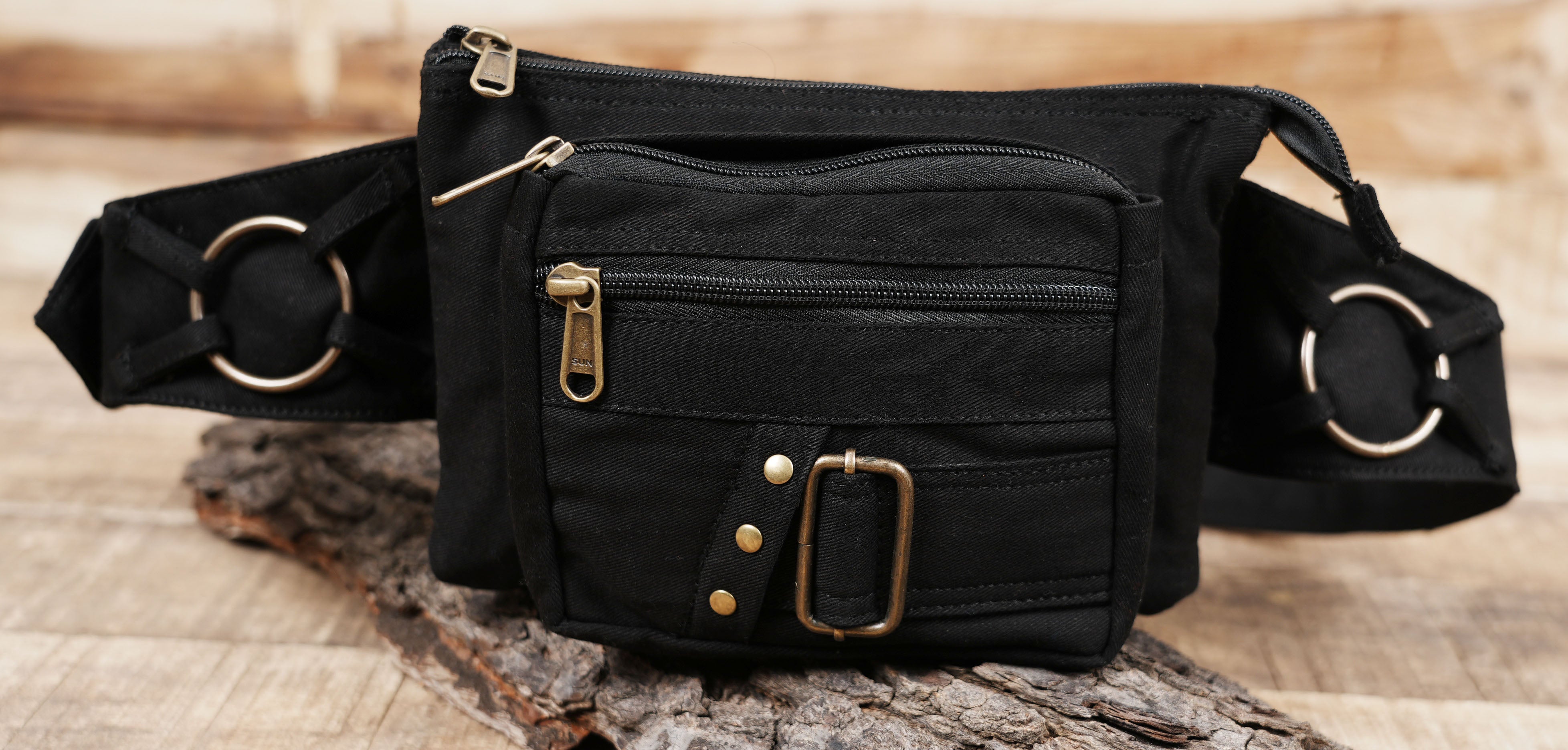 Festival utility belt bag featuring metal rings and buckle straps
