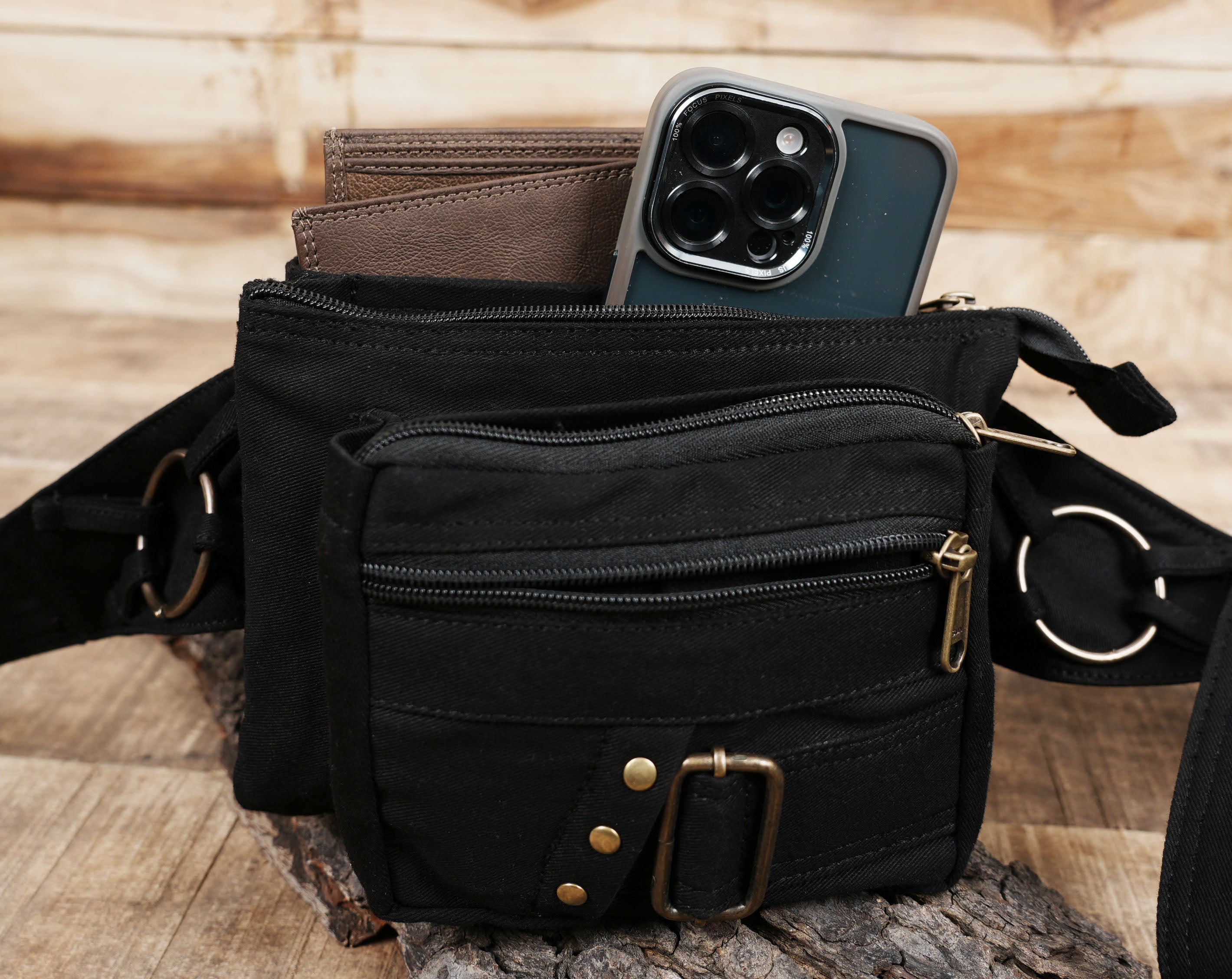 Festival-ready black cotton waist bag with specialized zipper compartments
