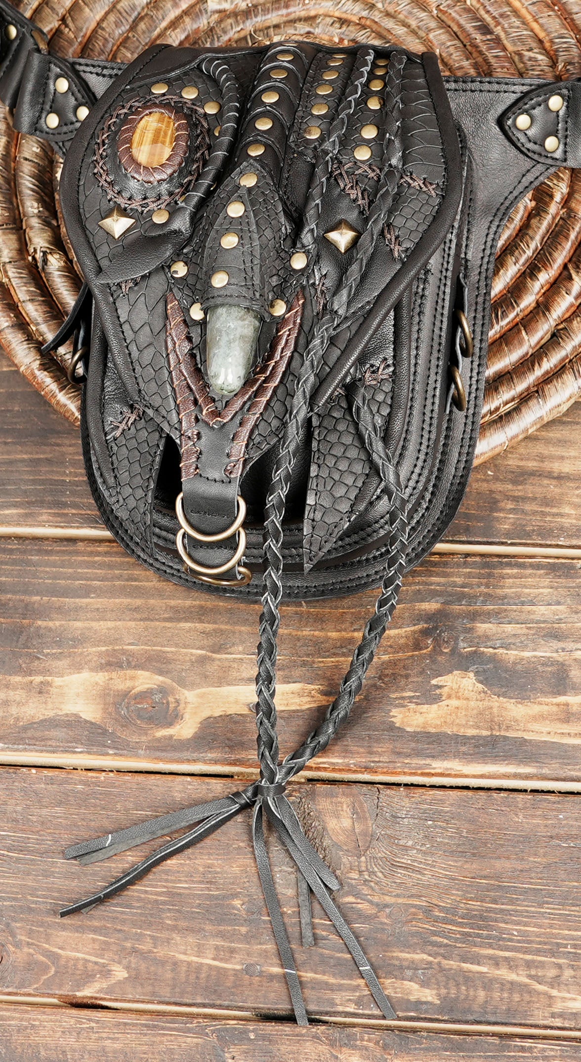 Western-style leather belt bag with studs and natural stone centerpiece