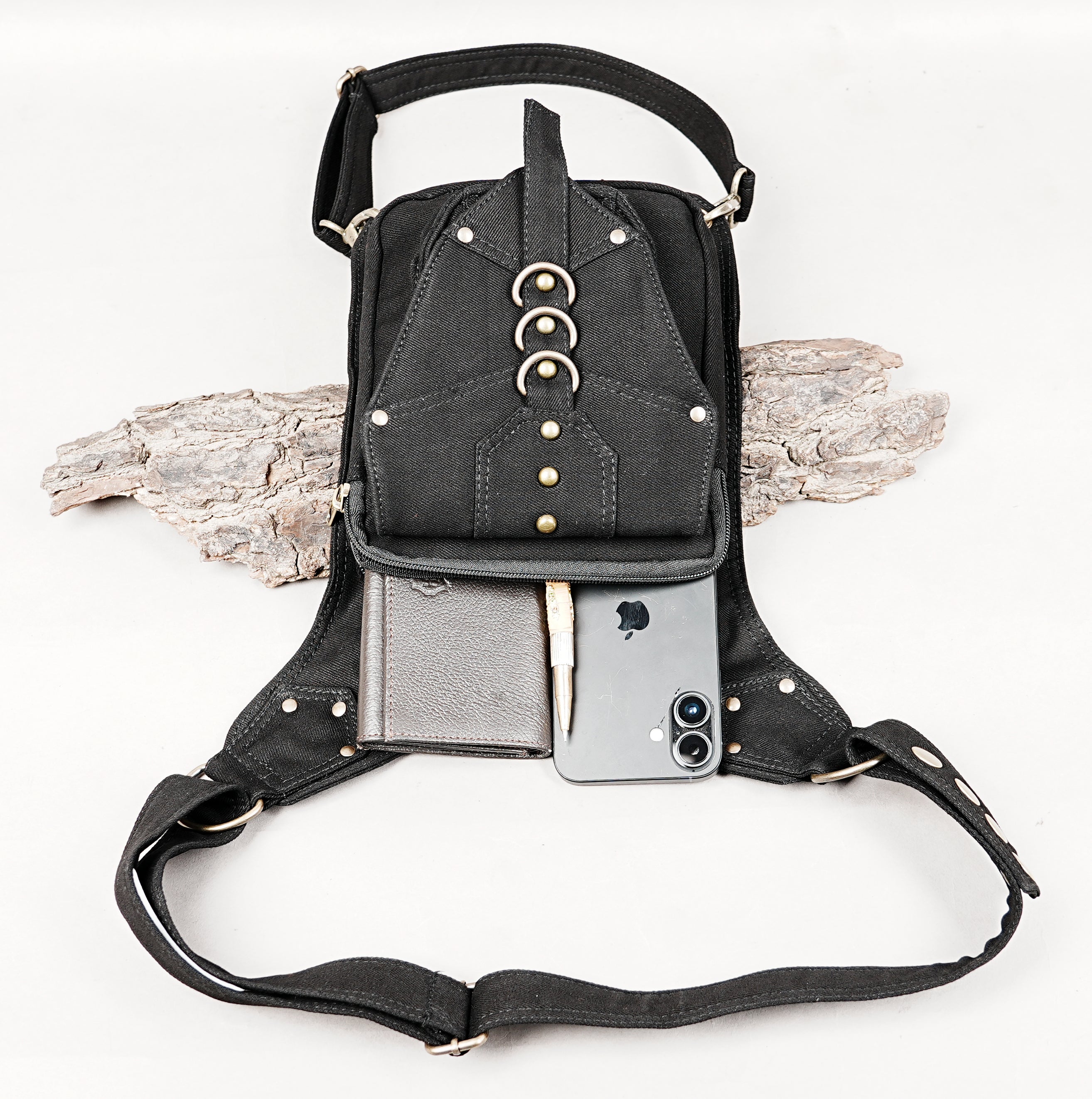 Biker style cotton thigh bag with swivel snap hooks and zippered compartments.