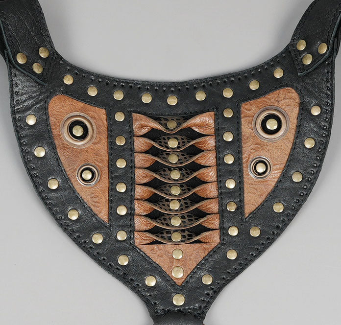 Steampunk style leather holster with geometric stitching and metal rivets
