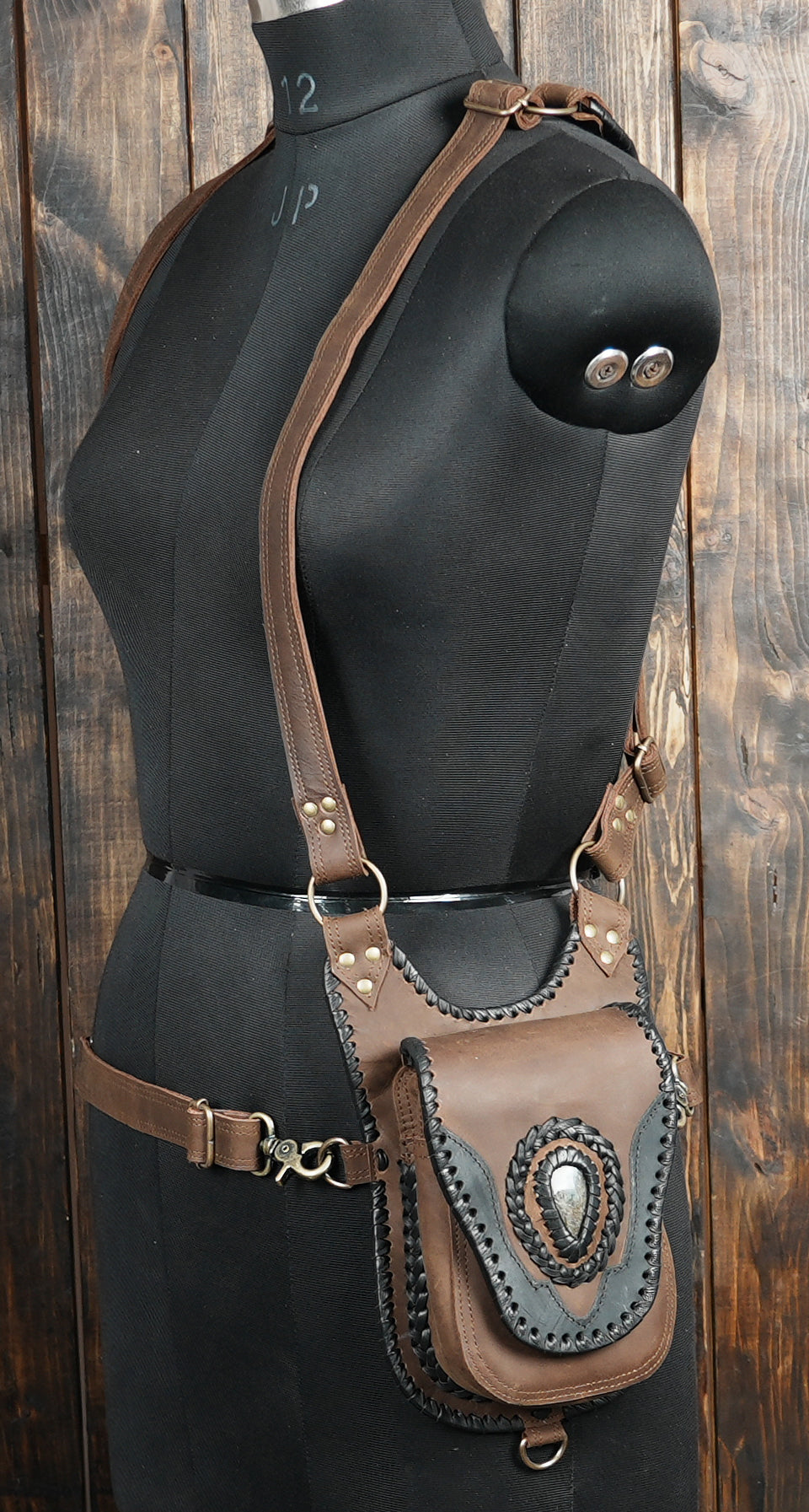 Decorative leather holster with braided edge finish