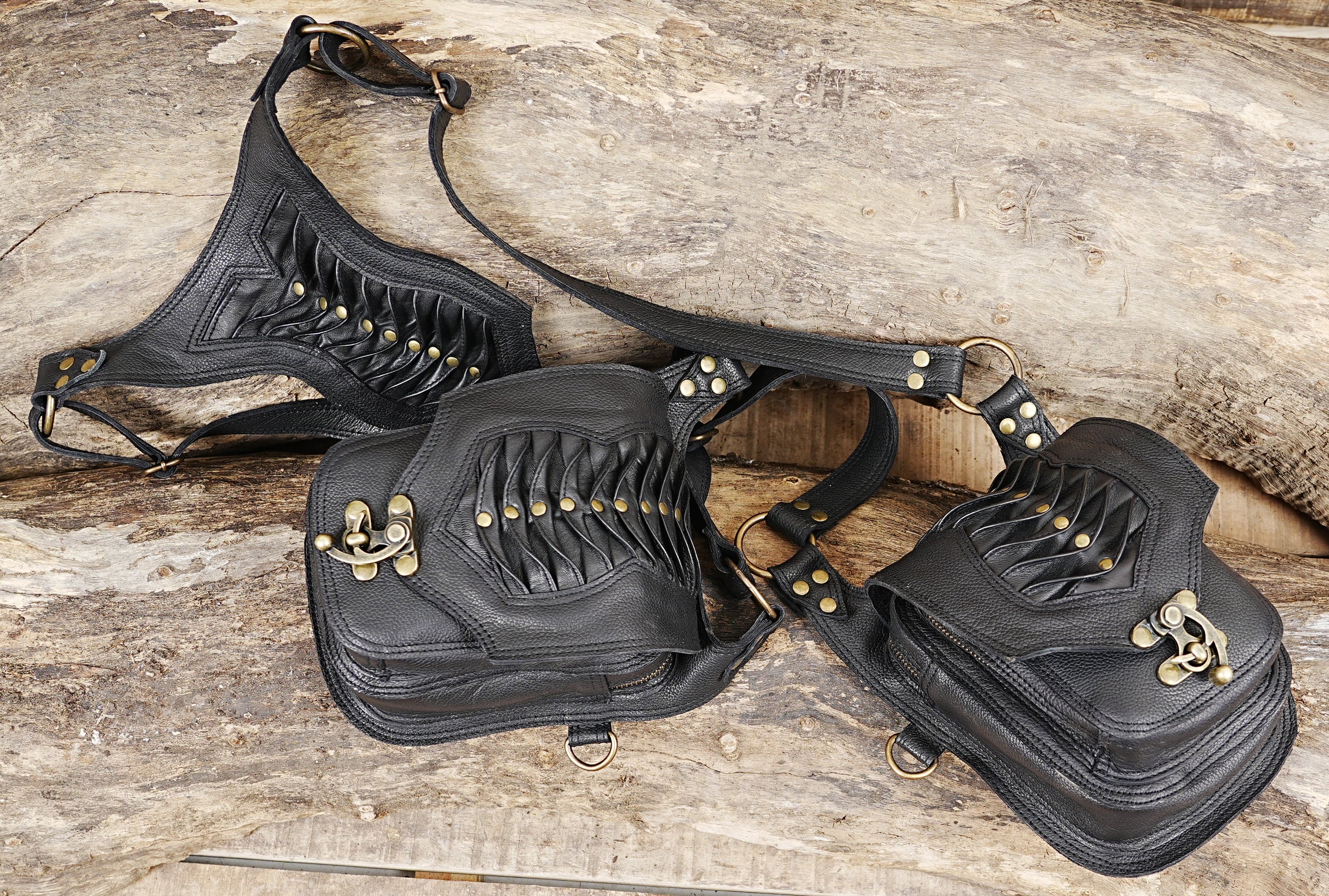 Black leather cargo holster with decorative stitching