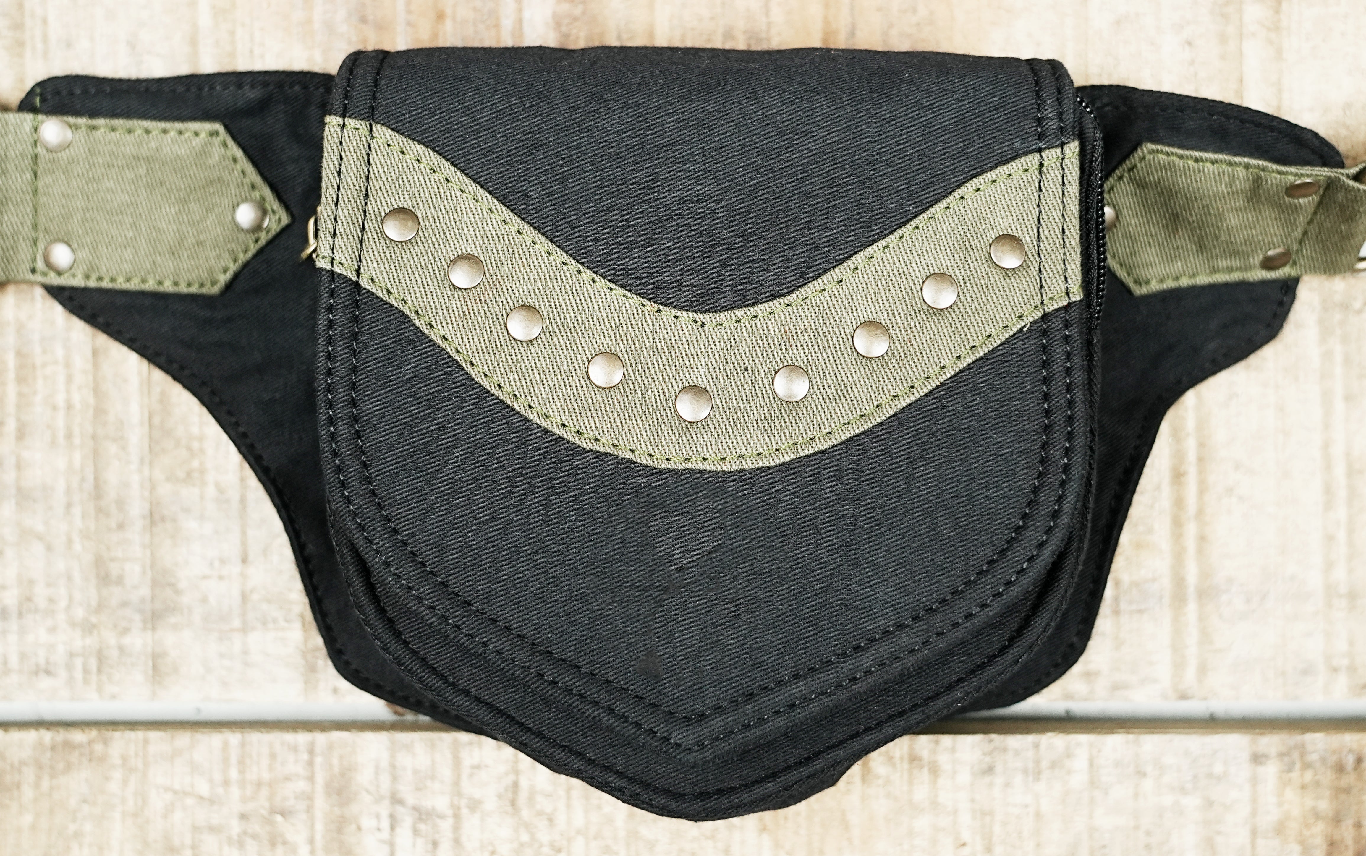 Alternative rave fanny pack with pointed front flap and zip compartment