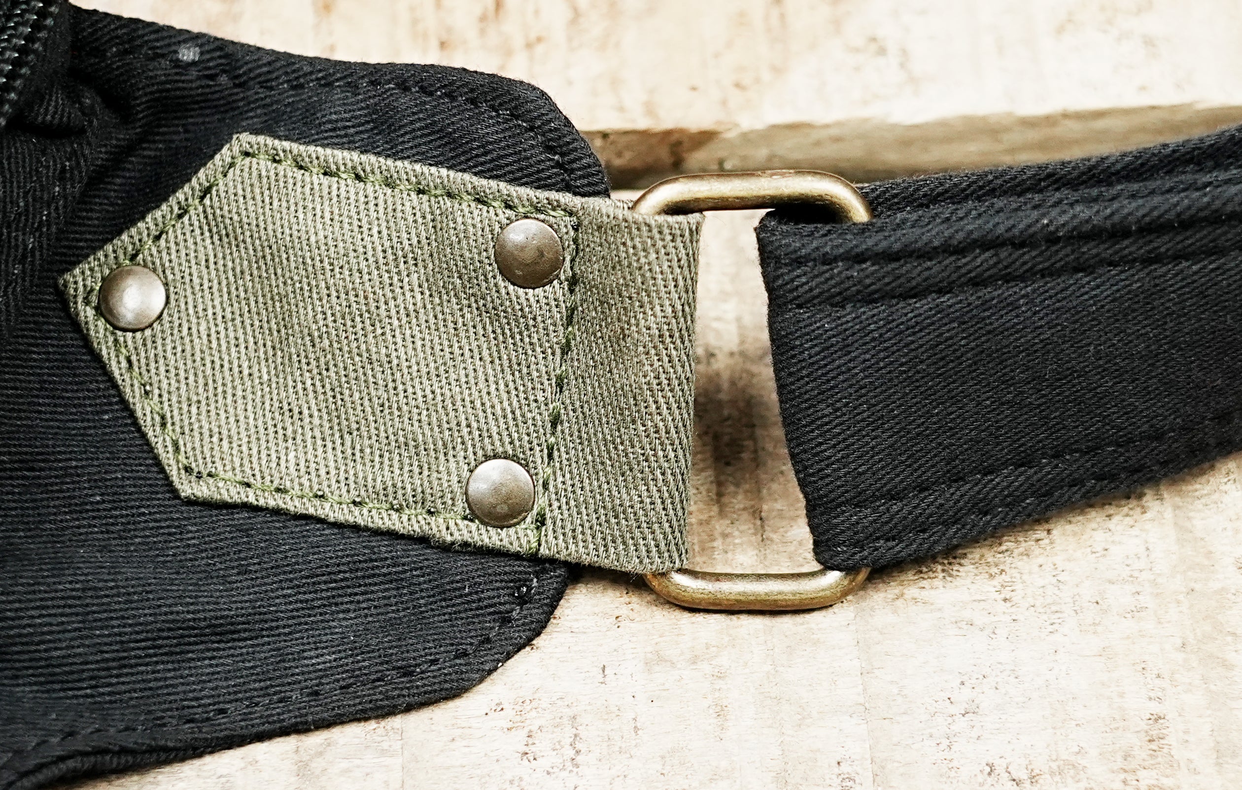 Unisex bohemian waist pack with curved flap and brass-tone clasp