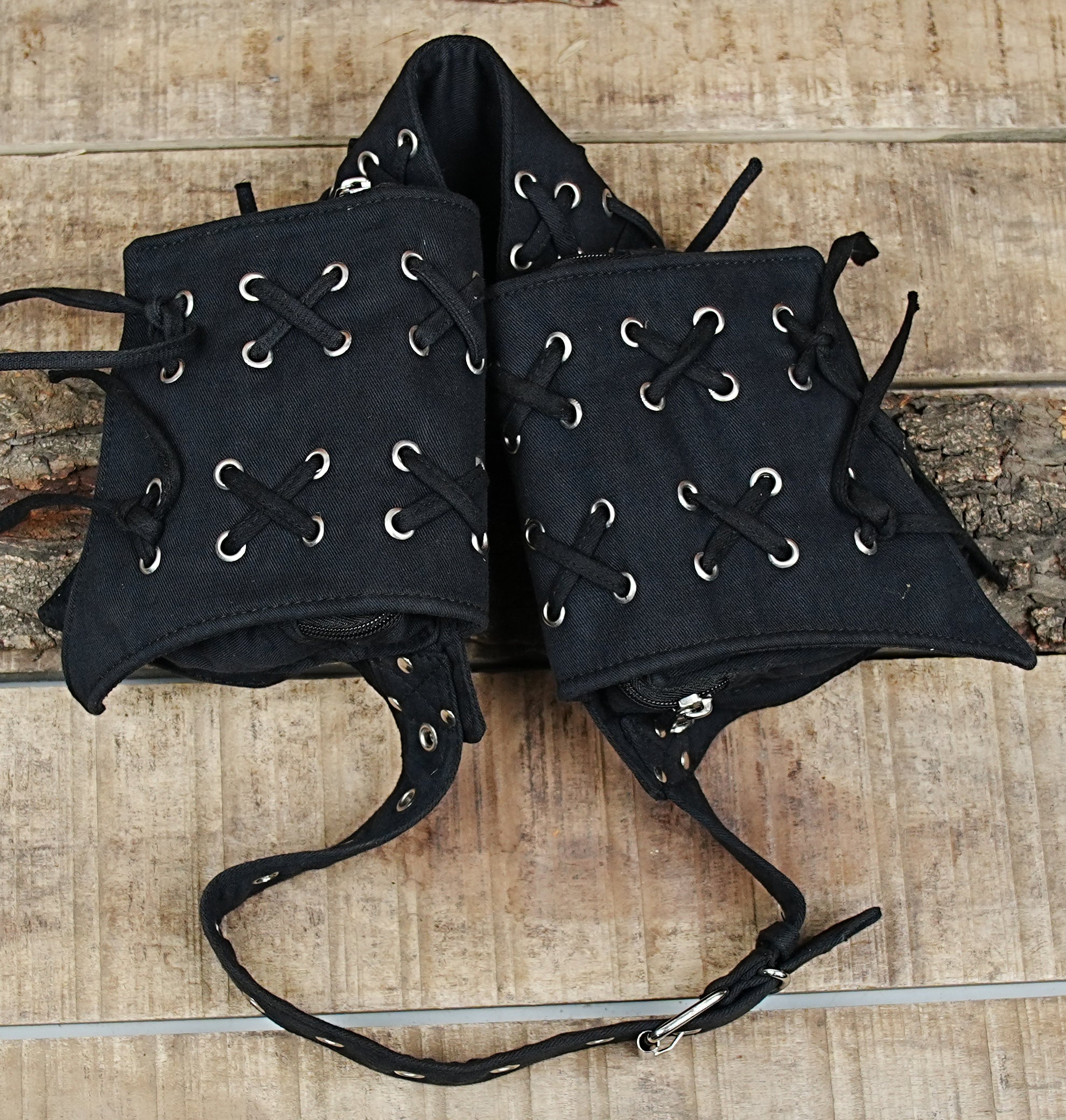 Hands-free cotton canvas bum bag with an asymmetrical four-pouch design for maximum organization.