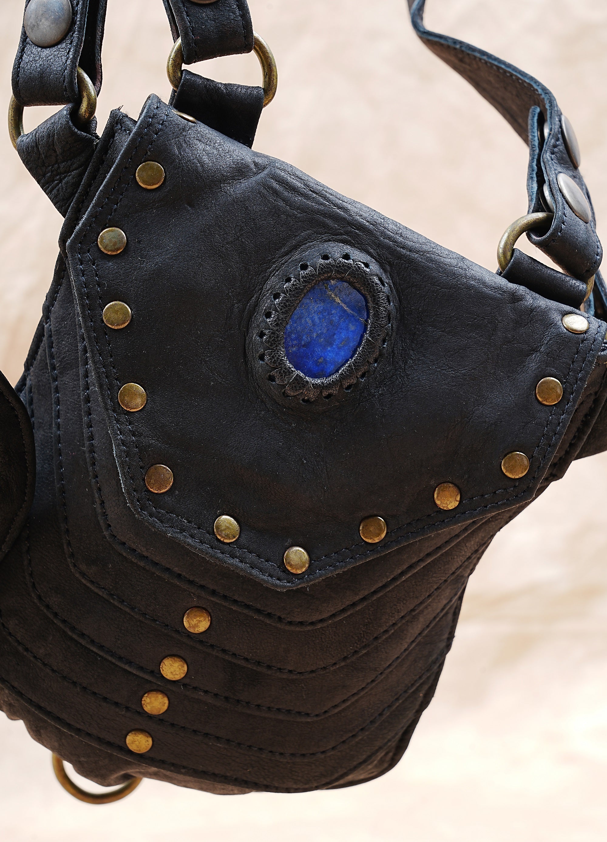 Festival style leather utility belt with dual pouch holsters