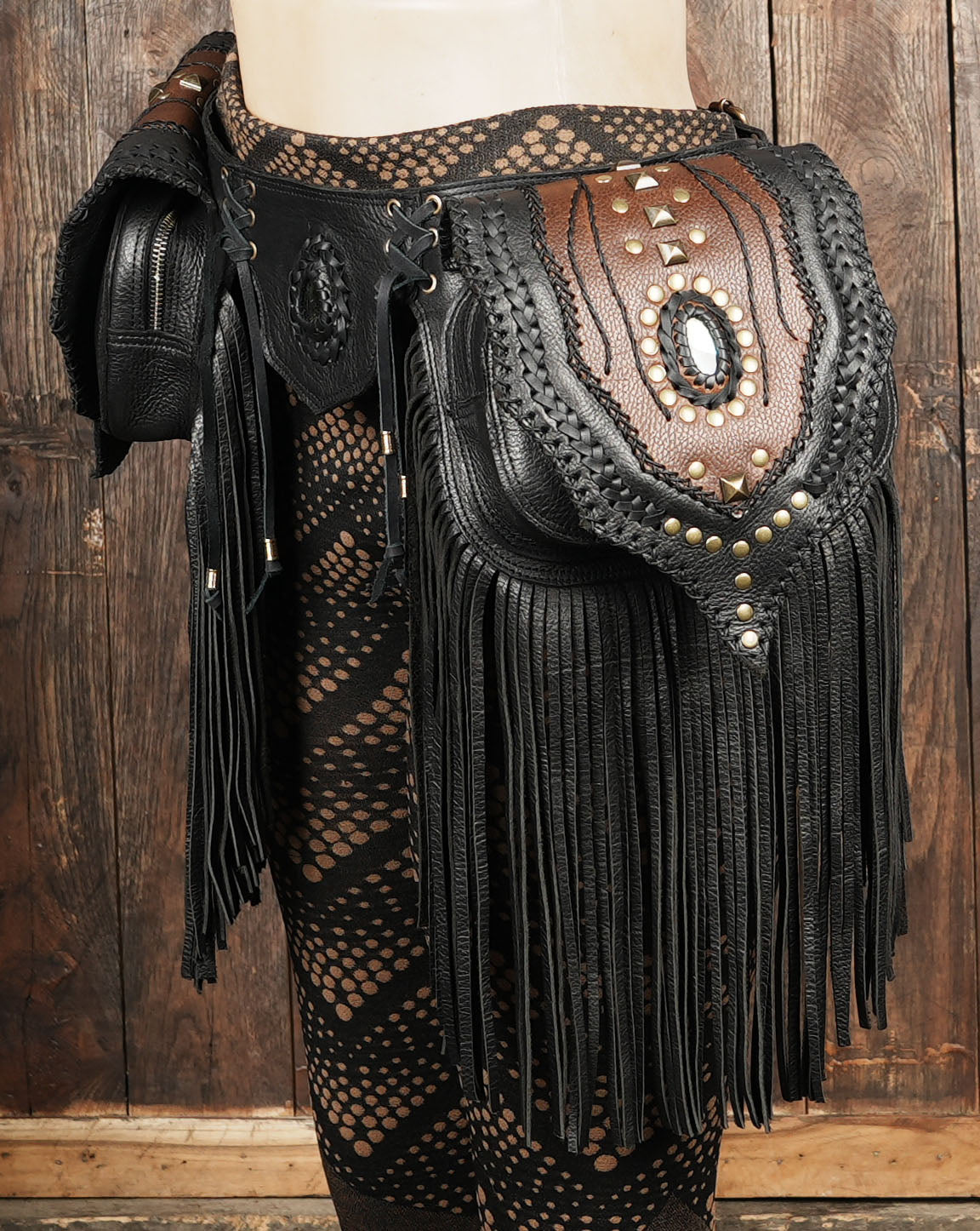 Rustic leather fringe belt with adjustable straps and hand stitched accents