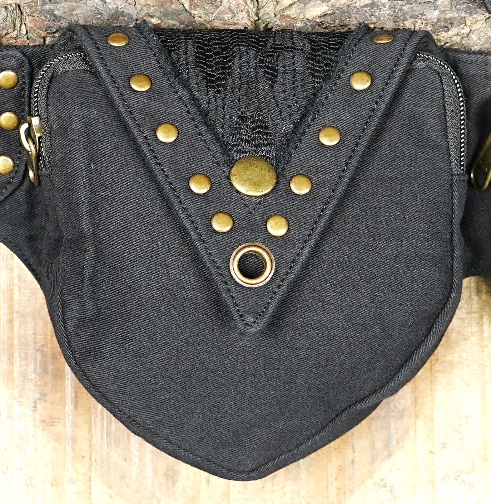 Three pocket utility waist belt with brass rivets and eyelet detailing