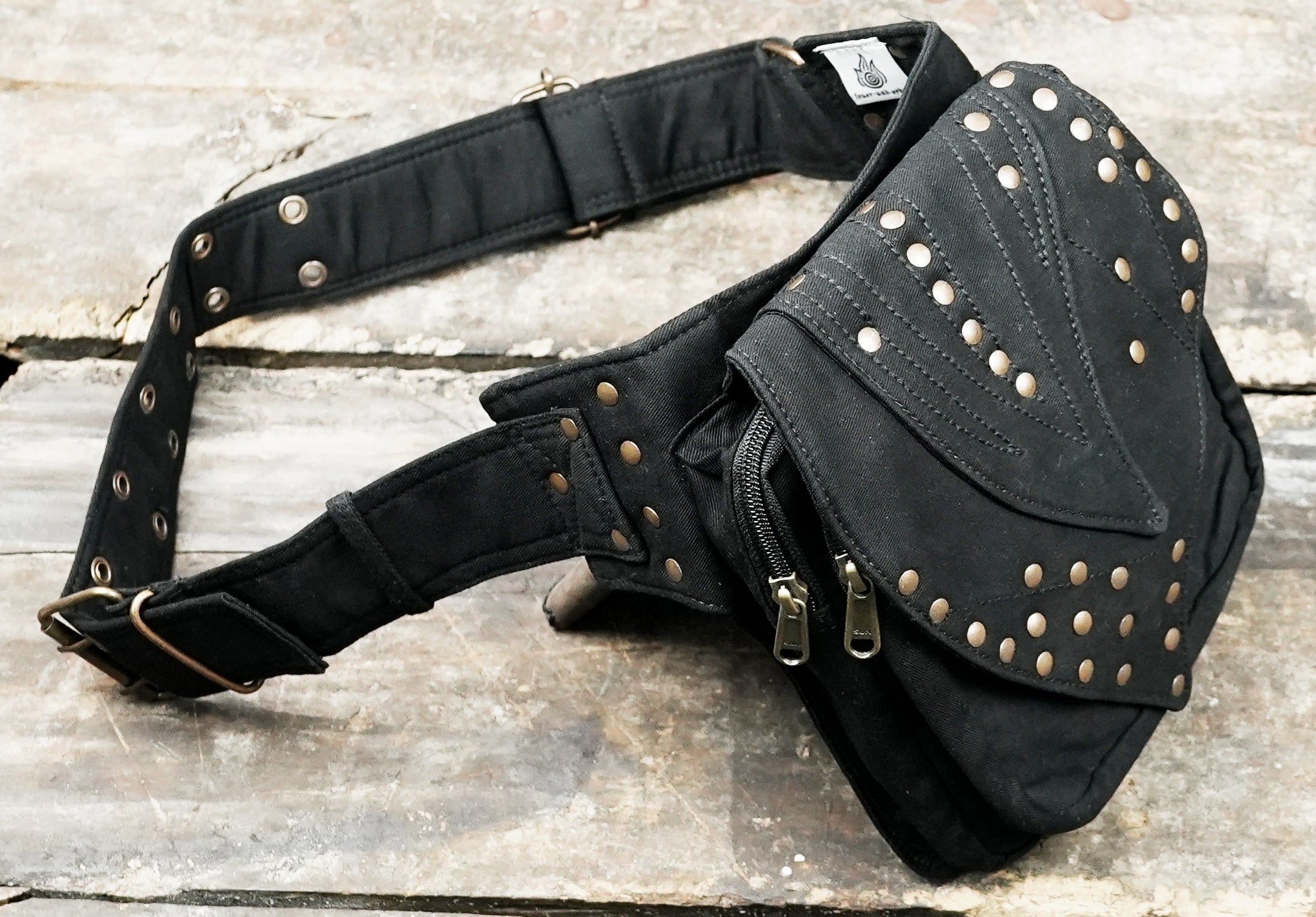 Alternative rave bum bag with antique brass hardware and multi-hole belt