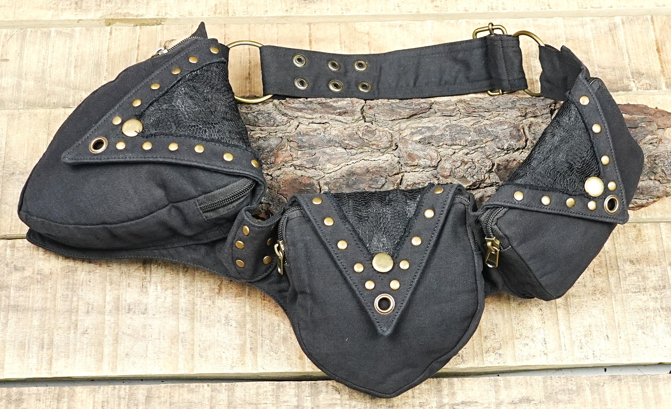 Studded festival hip bag in cotton canvas with brass O-rings and roller buckle