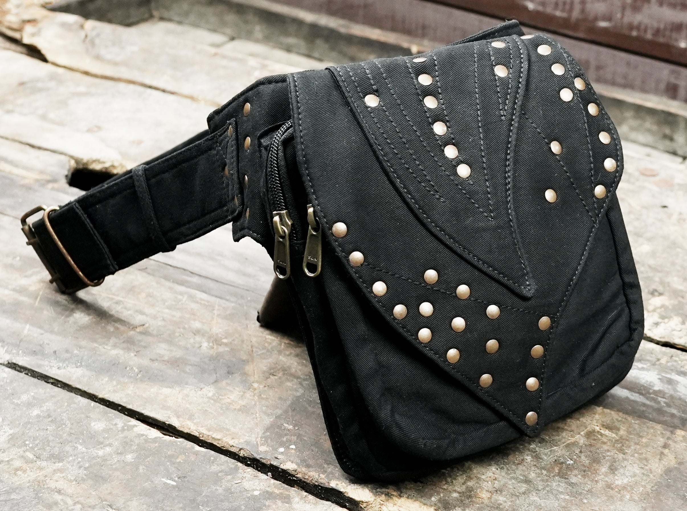 Burning man utility belt with pointed studded flap and zip compartment