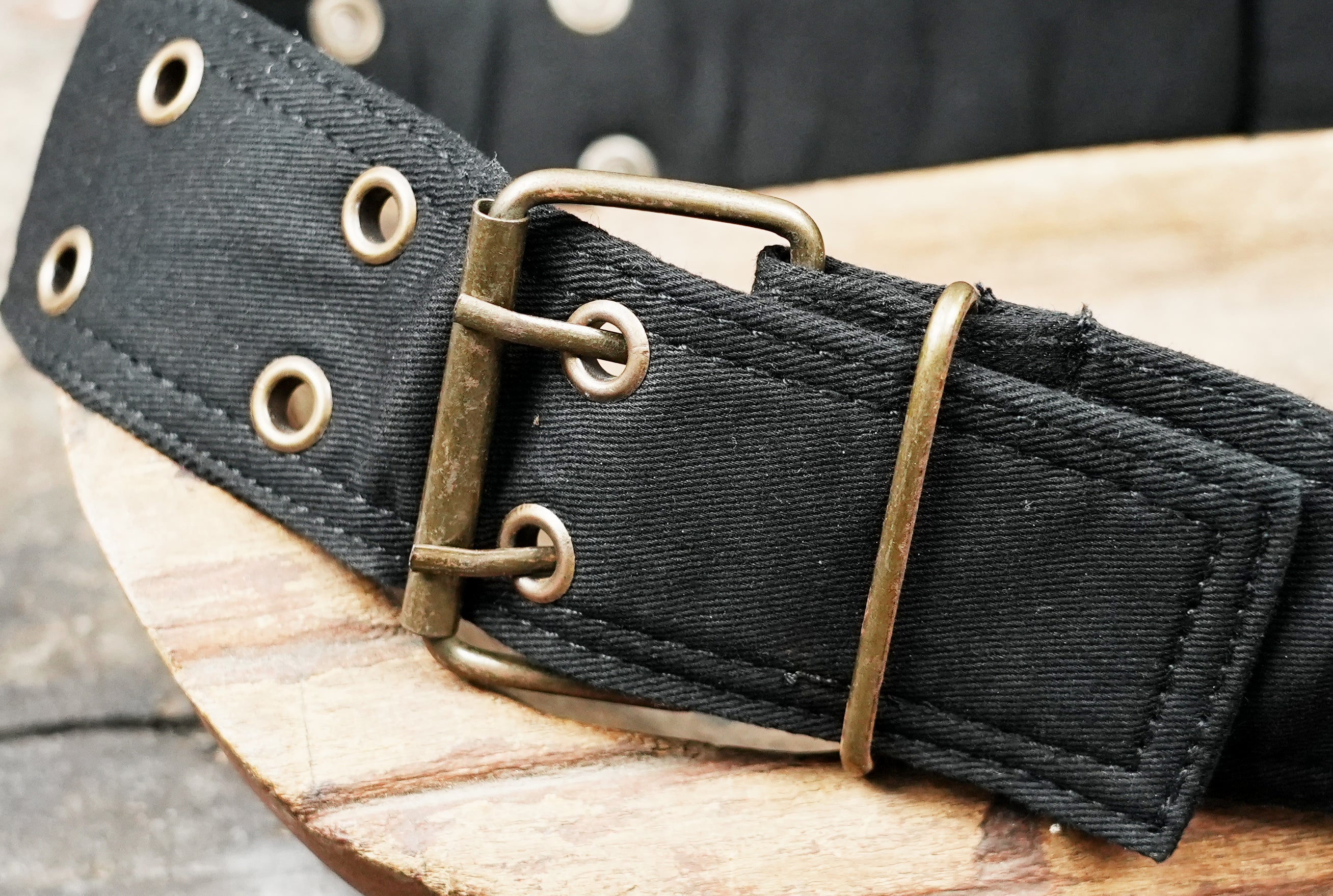 Gothic travel waist pack with double-buckle strap and brass eyelets
