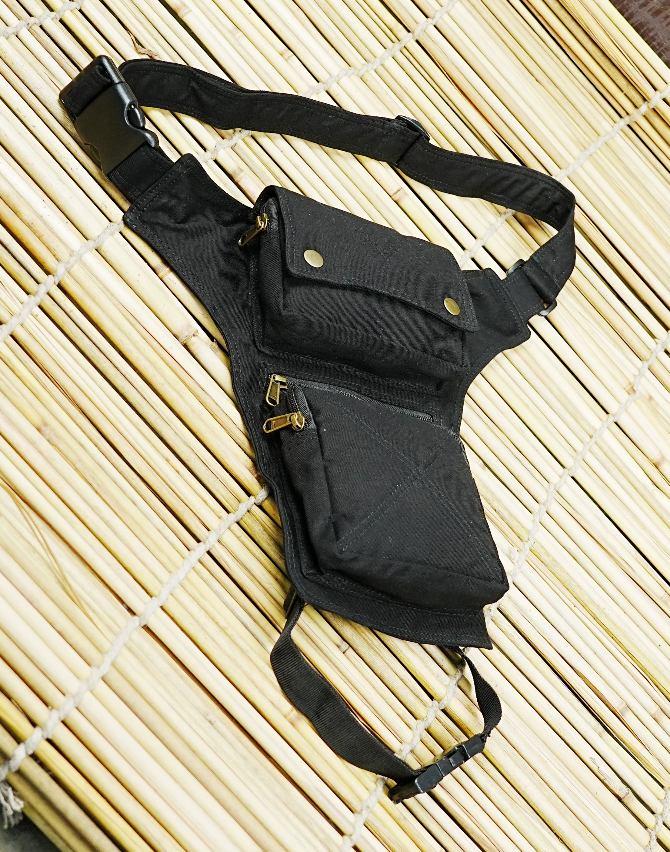 Women's black thigh bag with adjustable straps