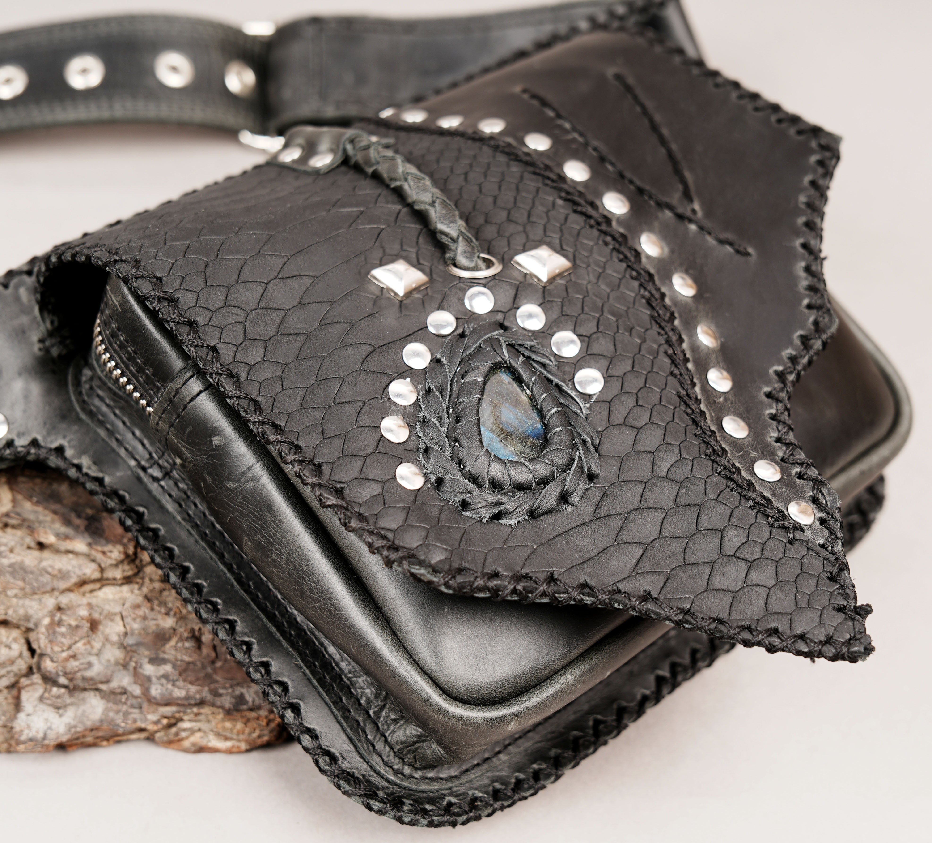 Handmade leather waist belt with braided texture and stone accents