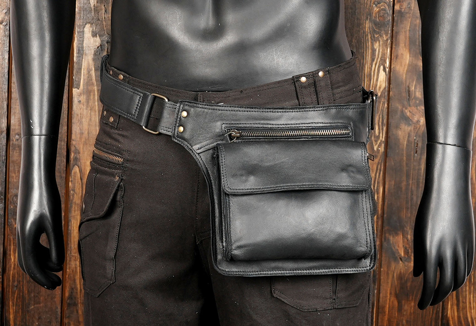 Stylish leather waist pack with front zipper and smooth finish