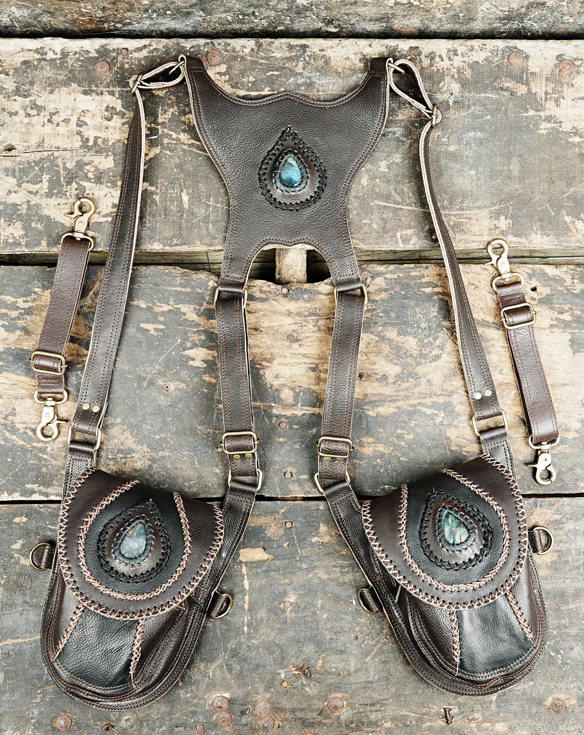 Leather utility holster with secure strap system