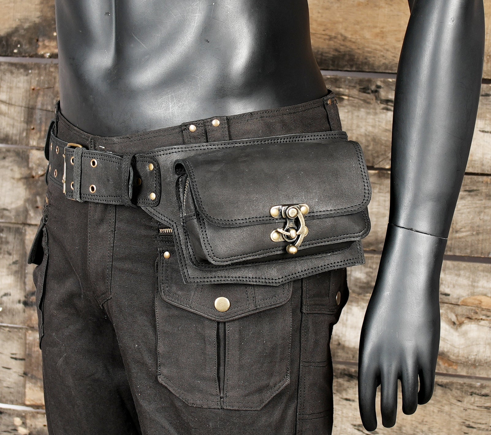 Double pouch leather belt bag in black with metal clasp closures