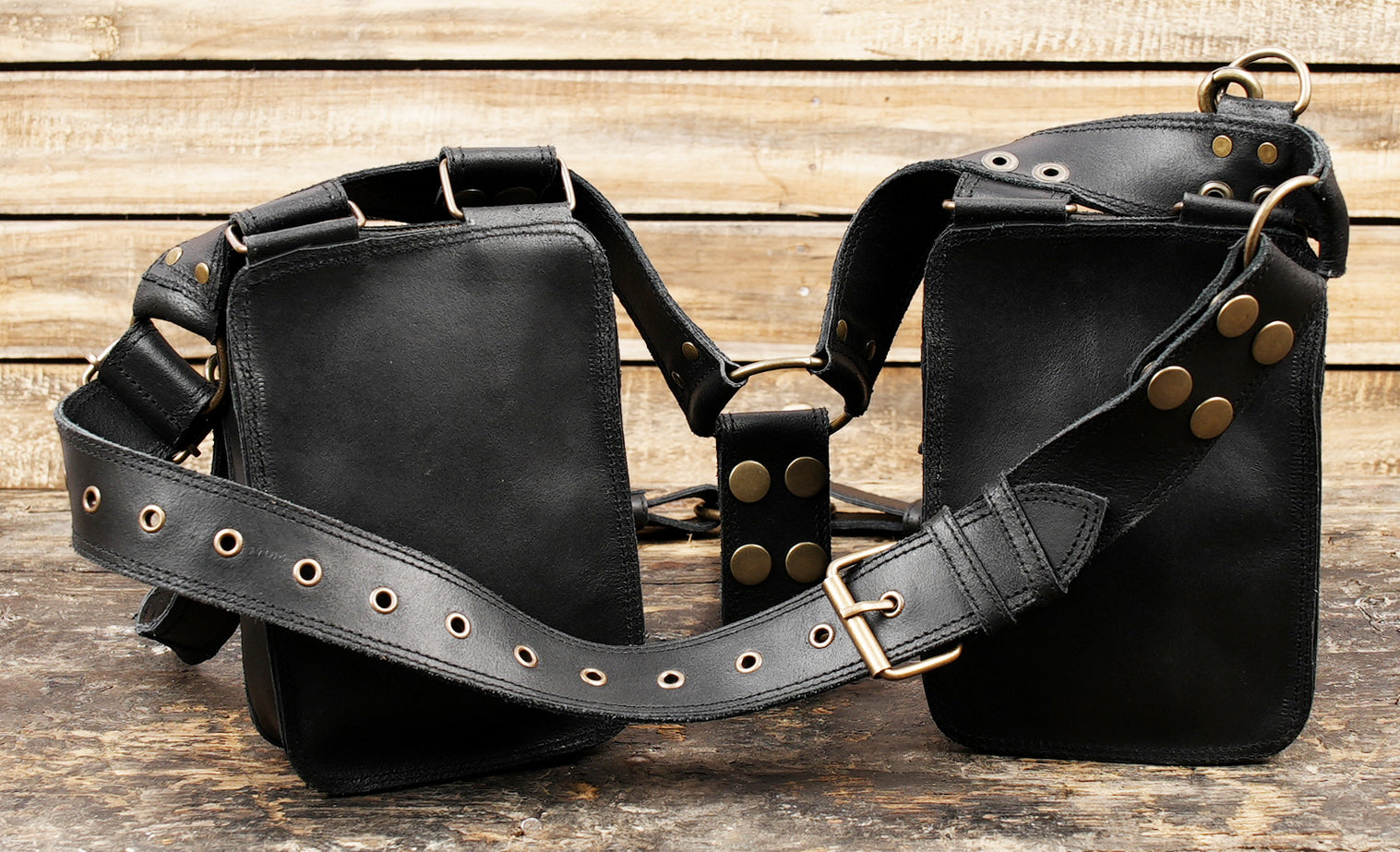 "Genuine leather holster belt with dual utility pouches"