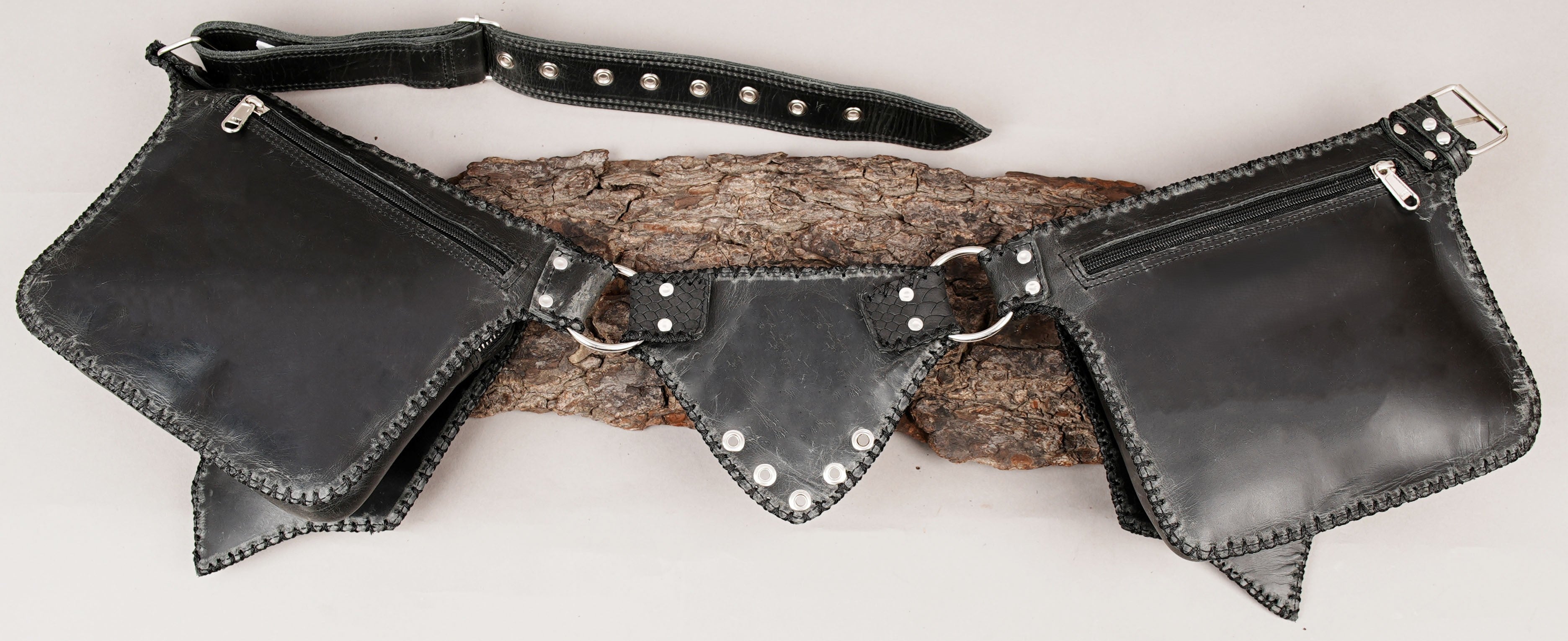 Leather waist belt with gemstone centerpiece pockets