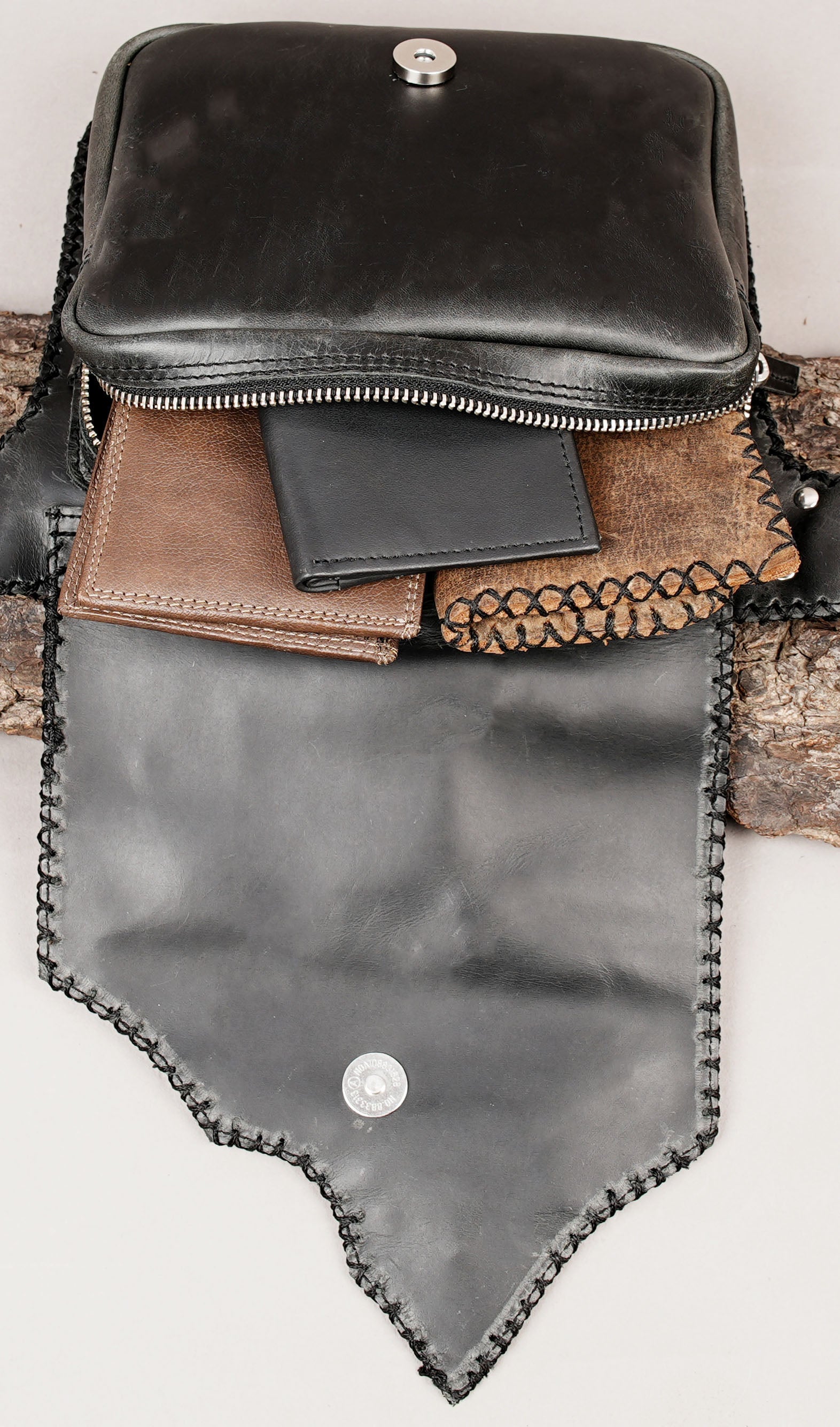 Leather hip belt with multiple pouch compartments