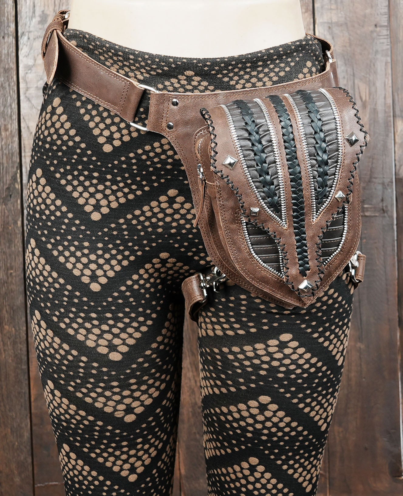 Brown festival hip pouch with intricate leather weaving pattern.