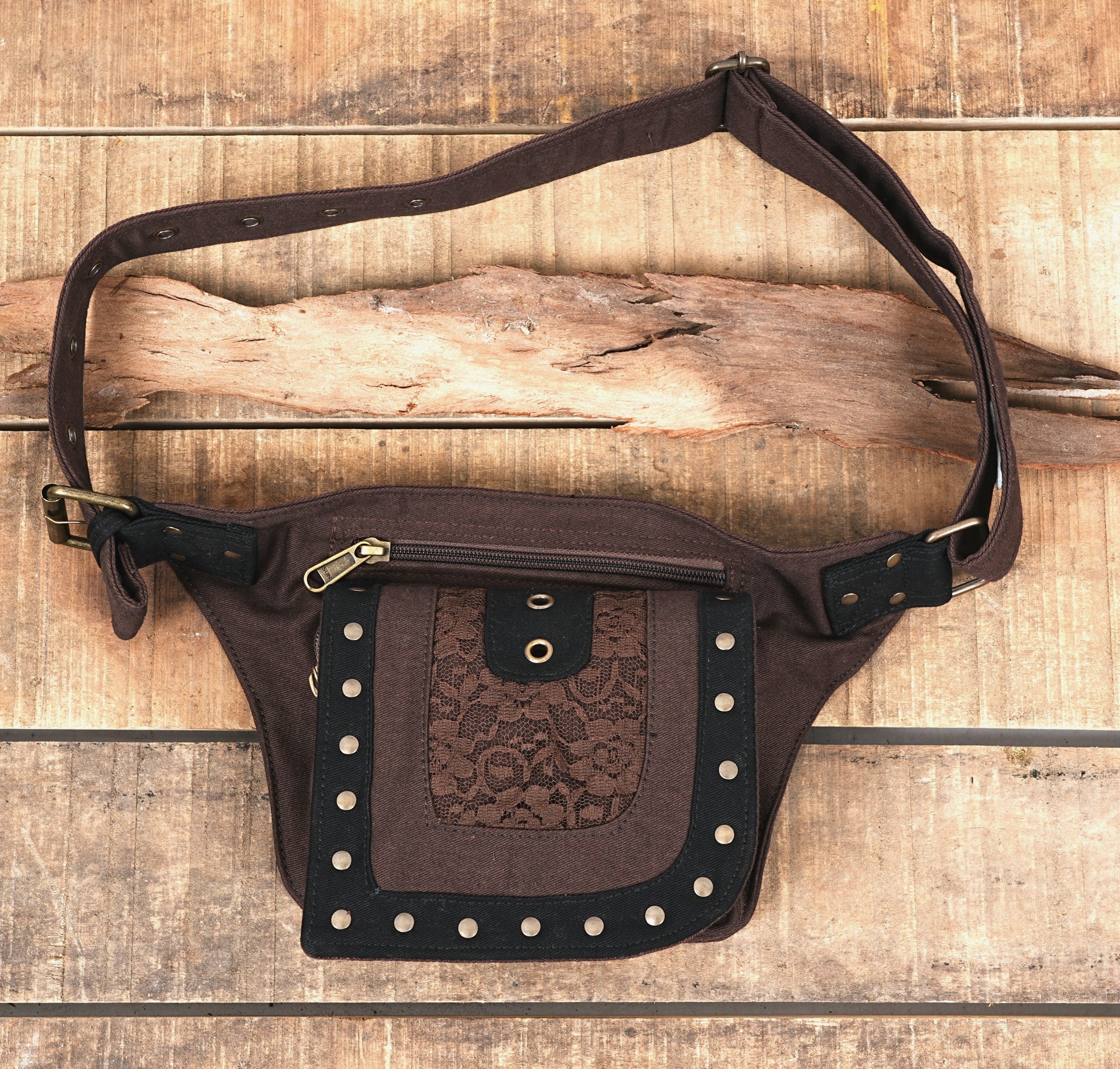 Black cotton fanny pack with brown leather trim and brass studs