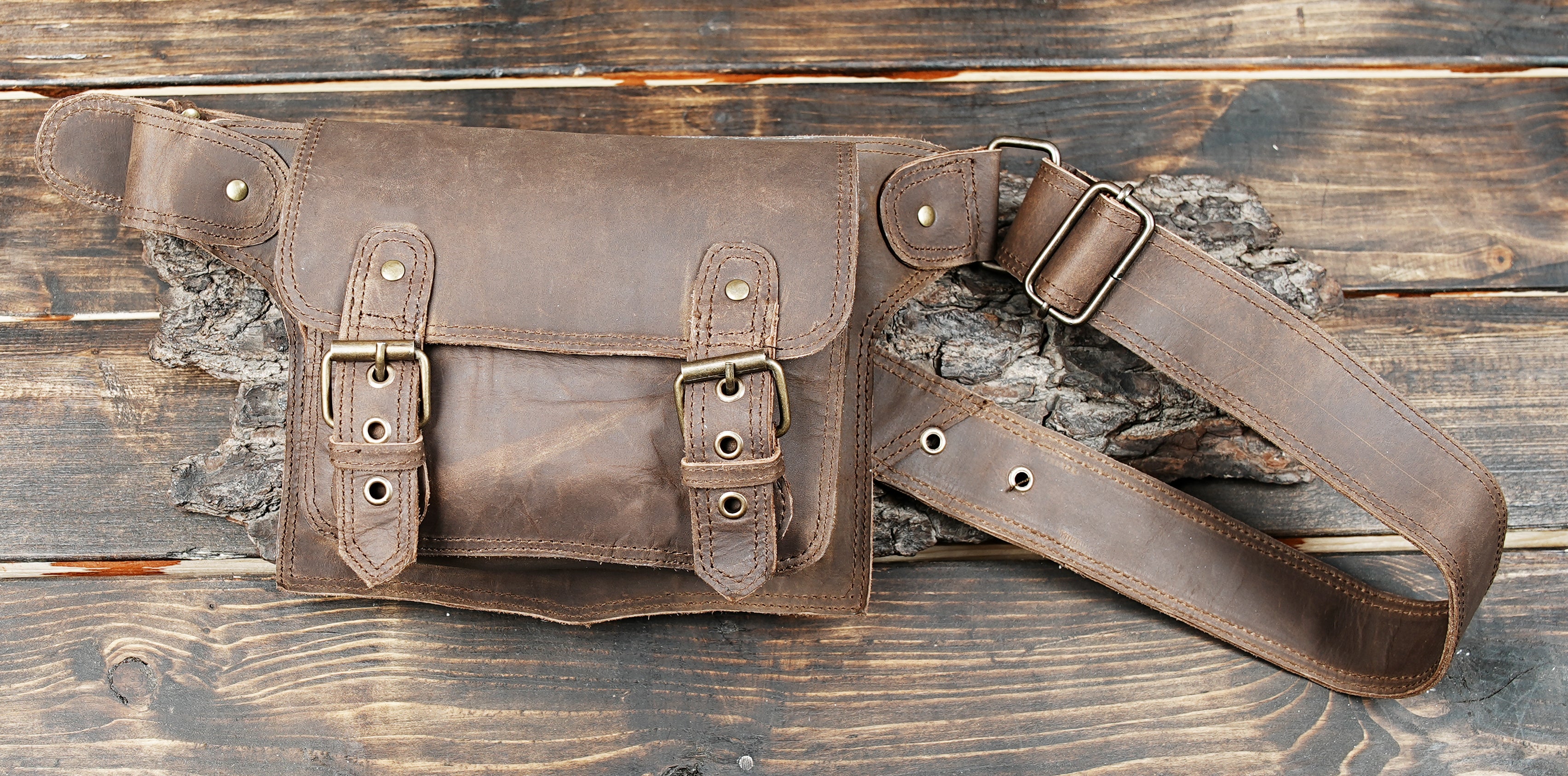 Stylish leather hip bag worn on waist for everyday carry