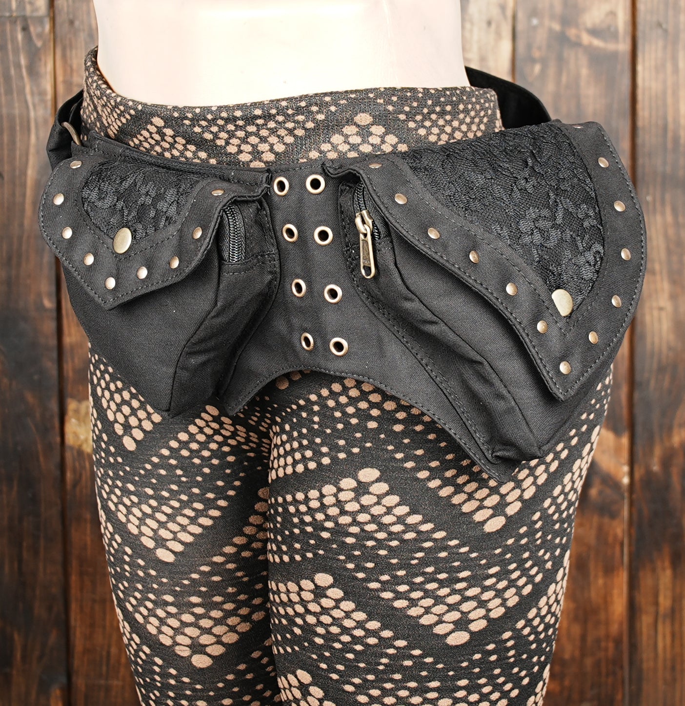 Black waist utility belt styled on dark mannequin