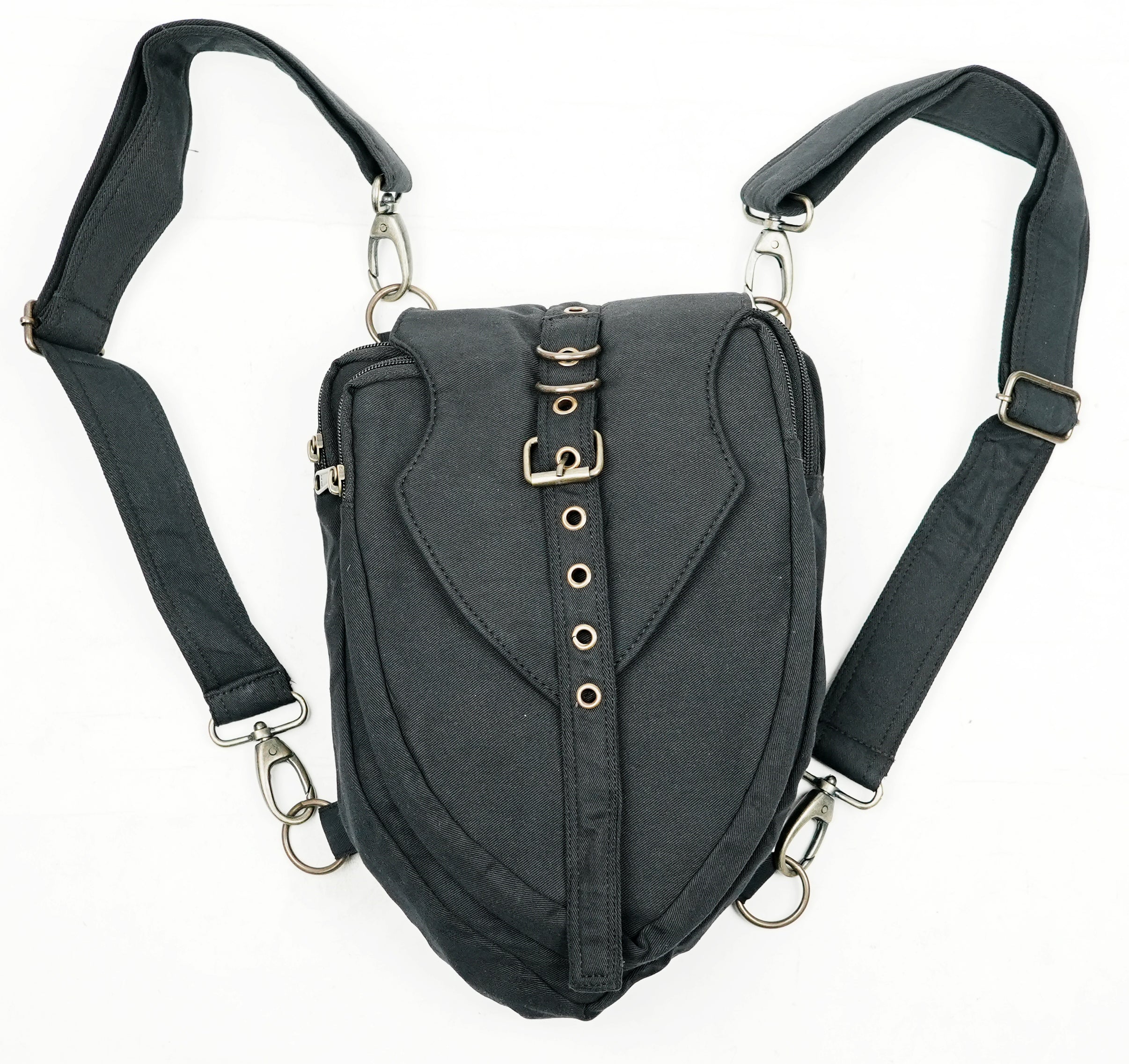 Convertible multi-way shoulder bag featuring a front buckle strap and eyelet details