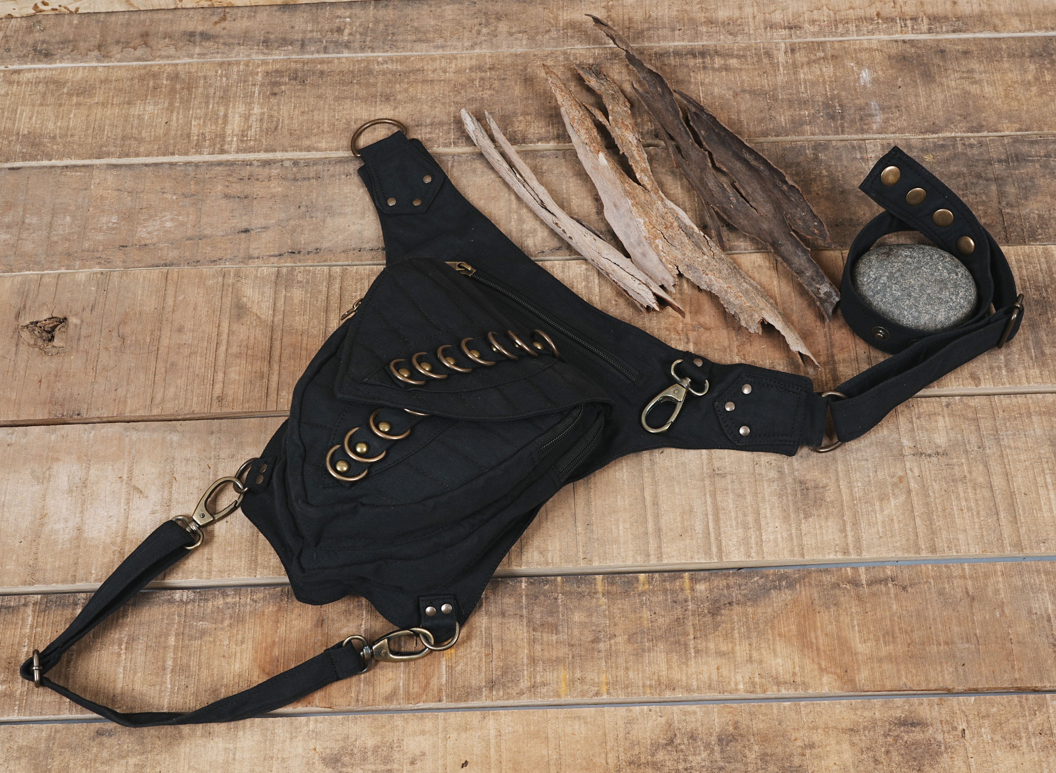 Gothic cyberpunk canvas waist pack with metal D-rings and thigh strap.