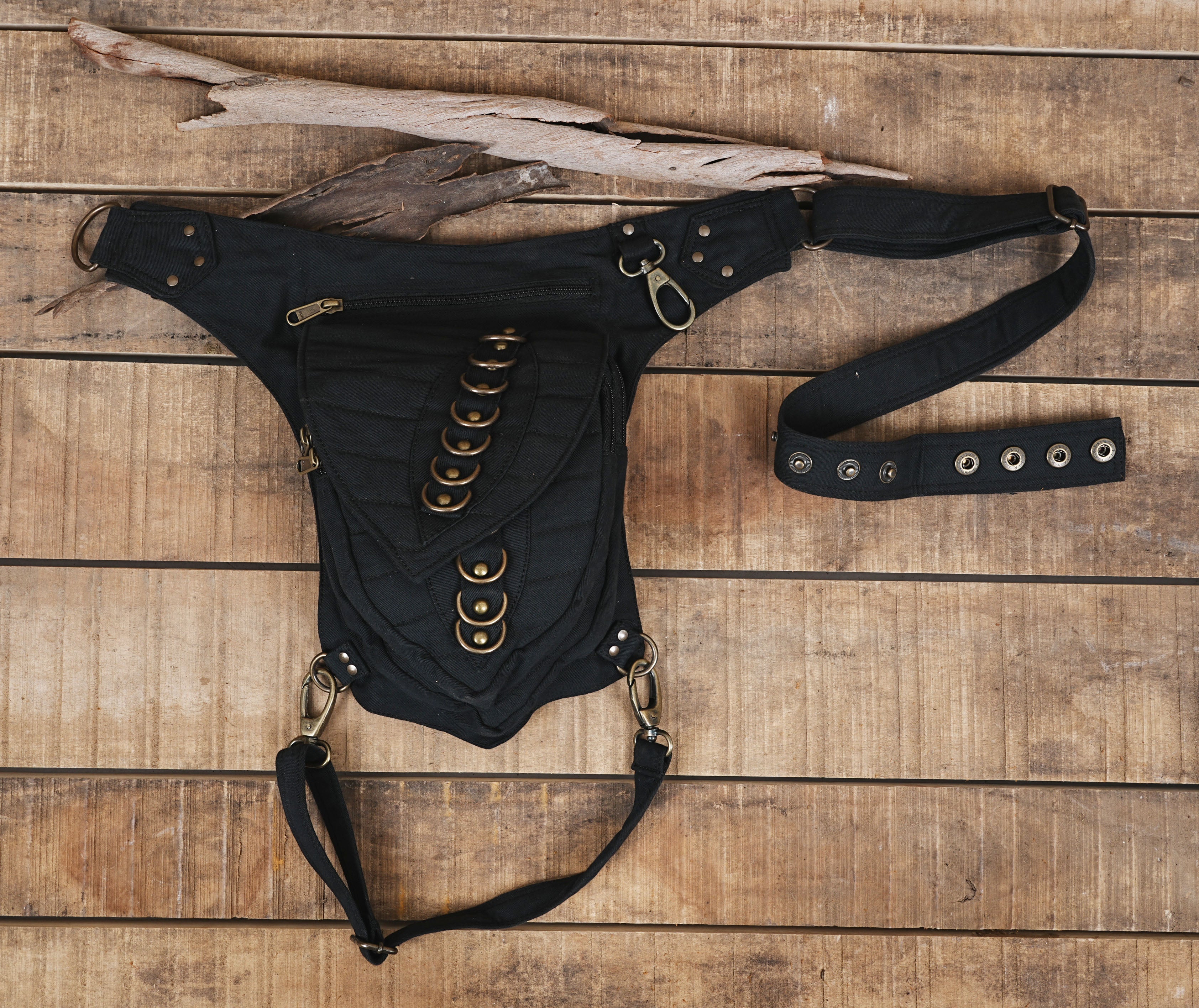 Utility drop leg fanny pack in black cotton canvas for travel and biking.