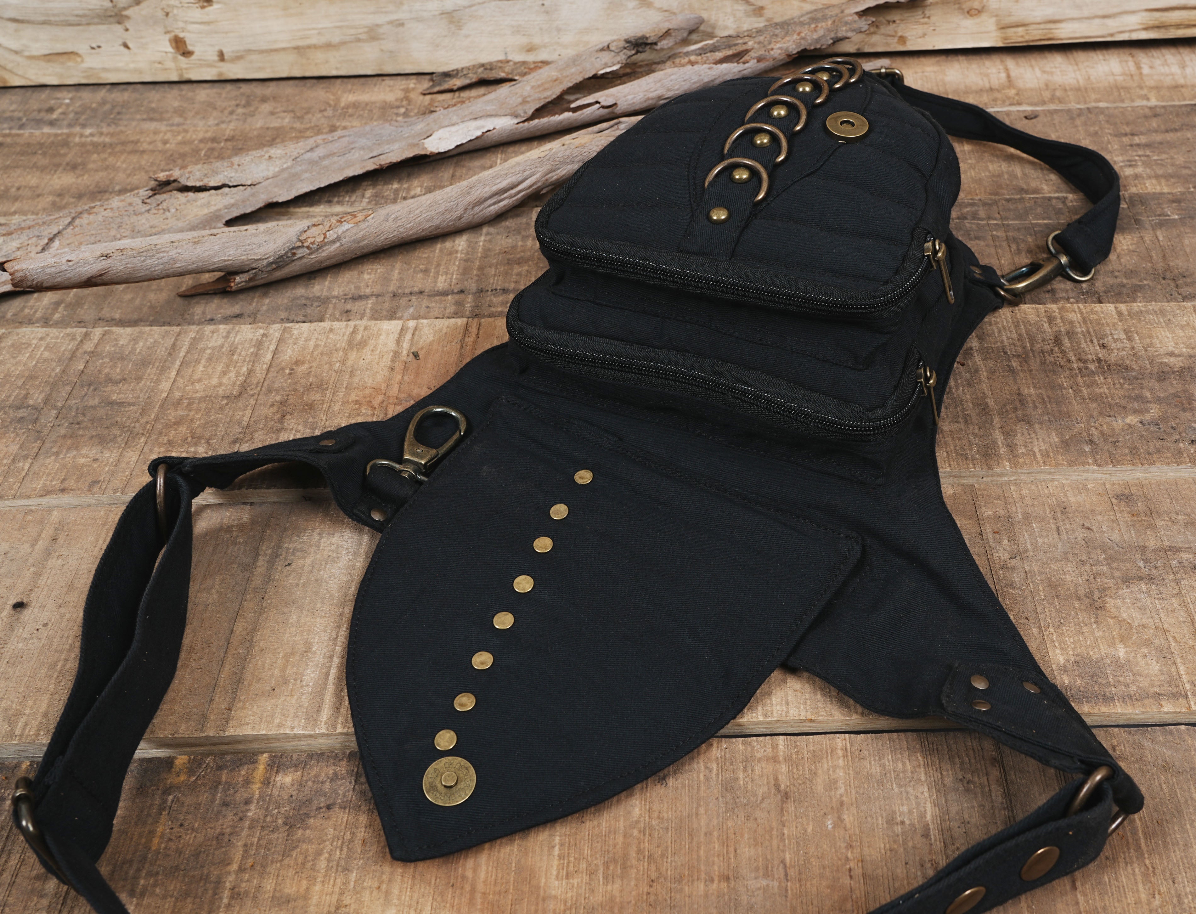 Festival hip pack with leg fastener in durable black cotton canvas.