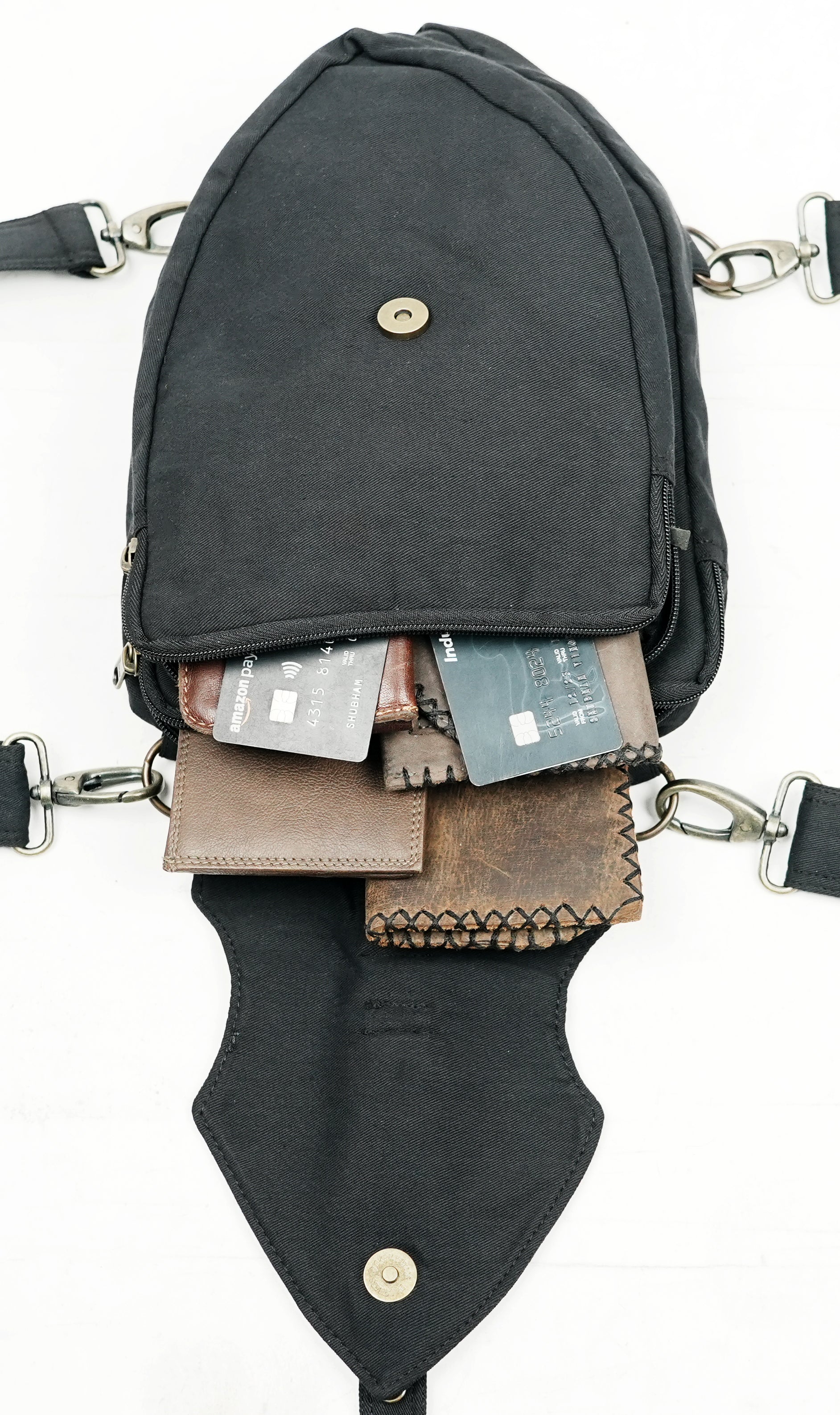 Industrial punk style multi-way bag with secure zippers and a front flap