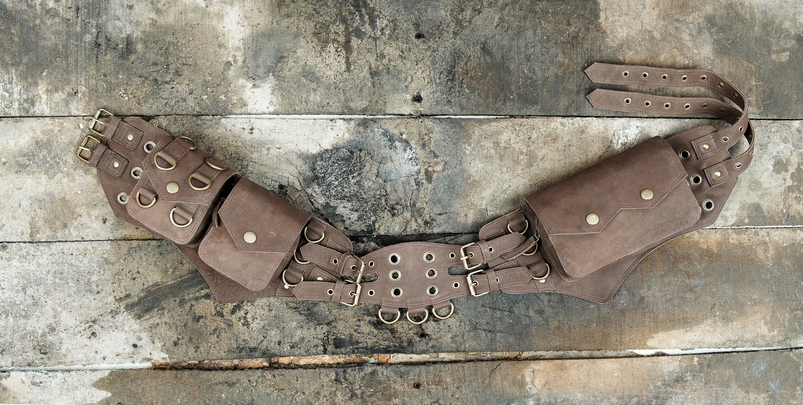 Handmade brown leather utility waist belt with multi-pocket pouches,