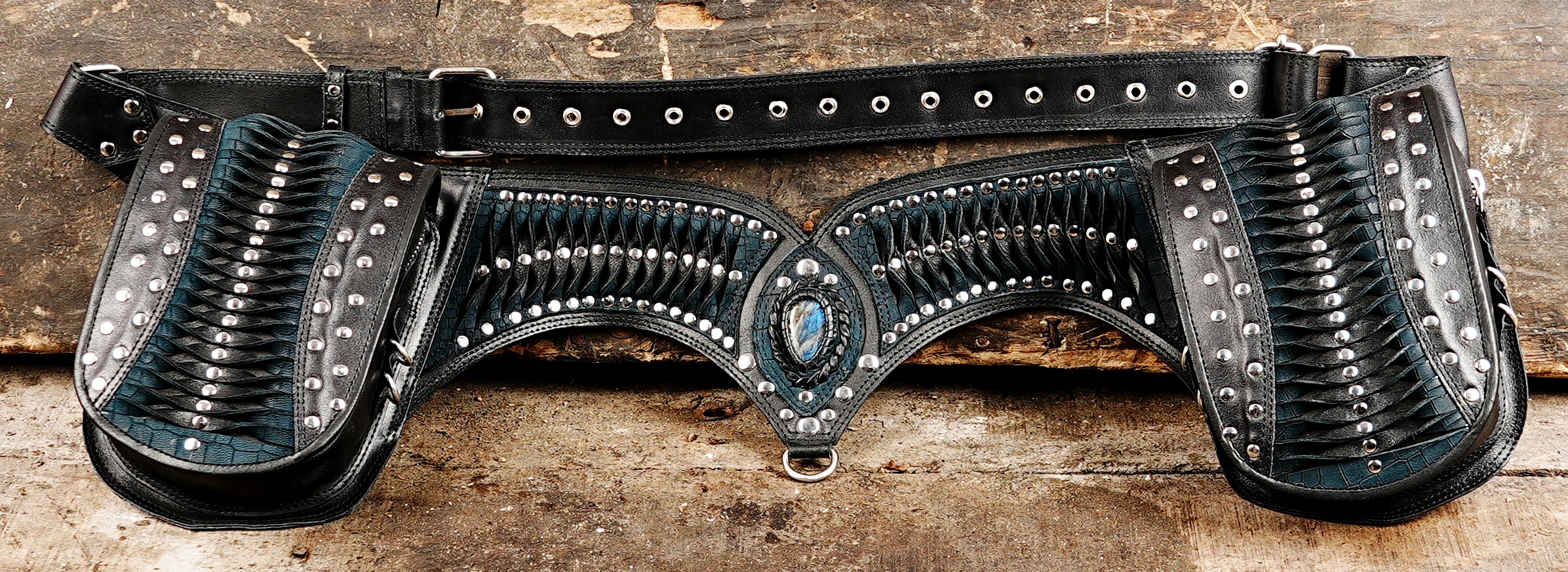 Designer western hip bag made from black leather with gemstone detailing