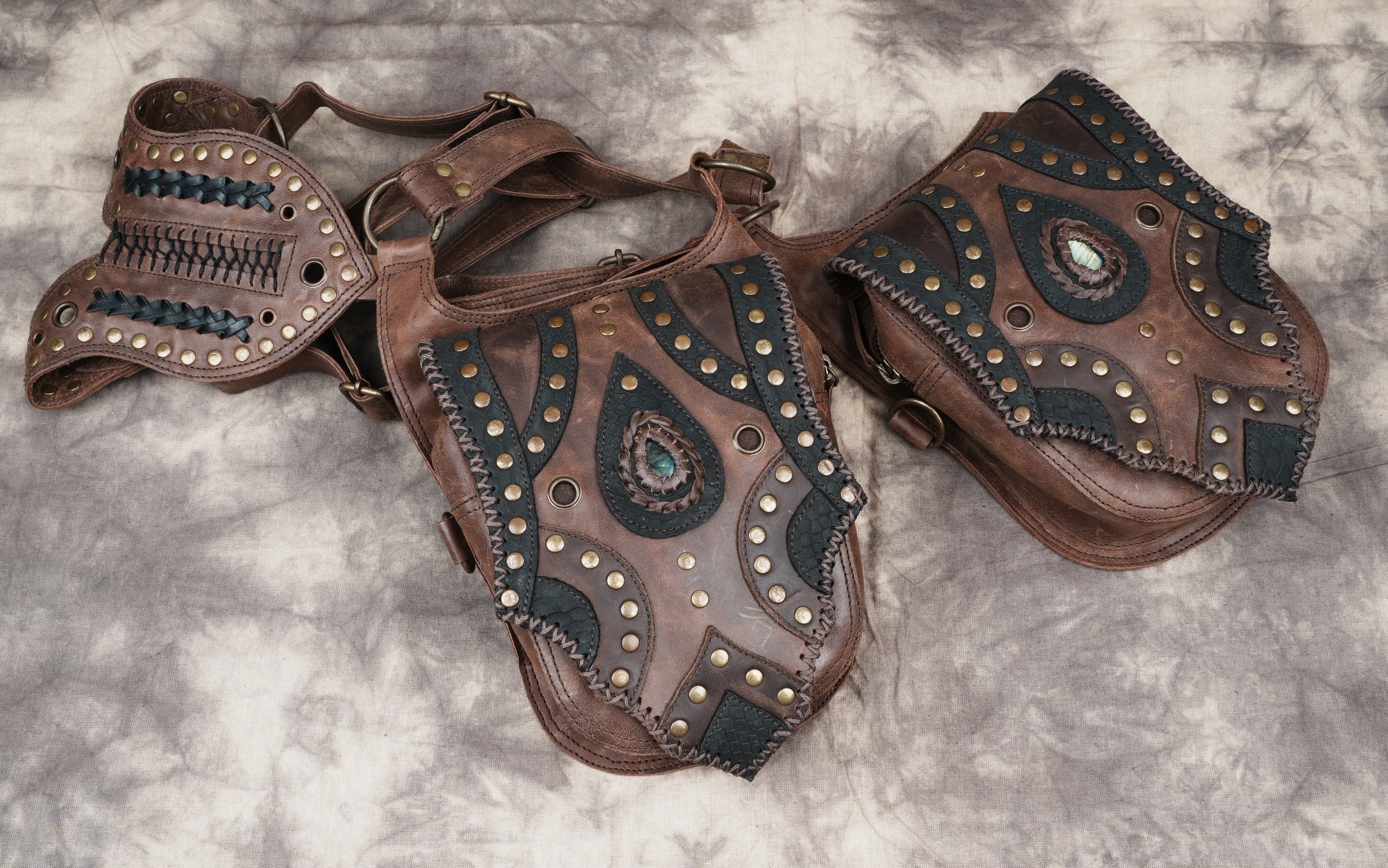 Leather harness-style holster with twin pouches and gemstone