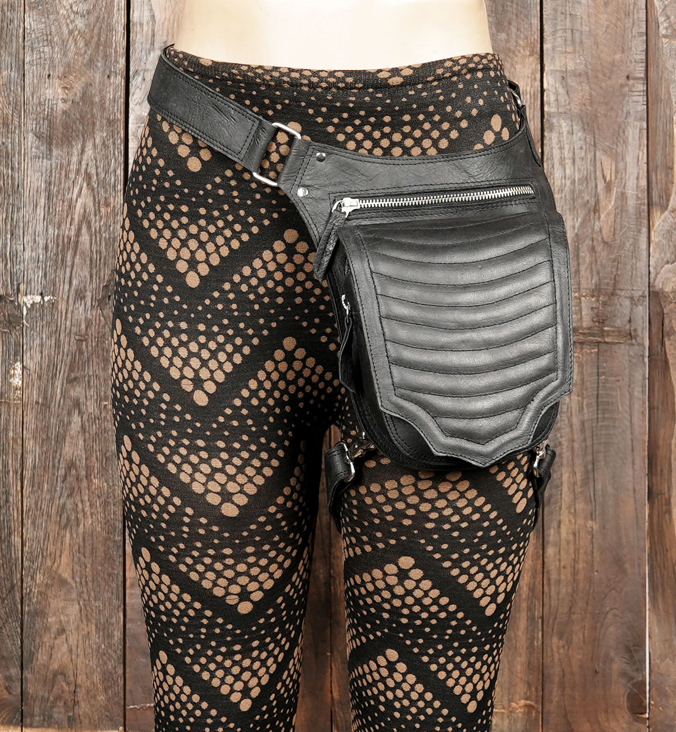 Designer black thigh belt with large secure pocket.