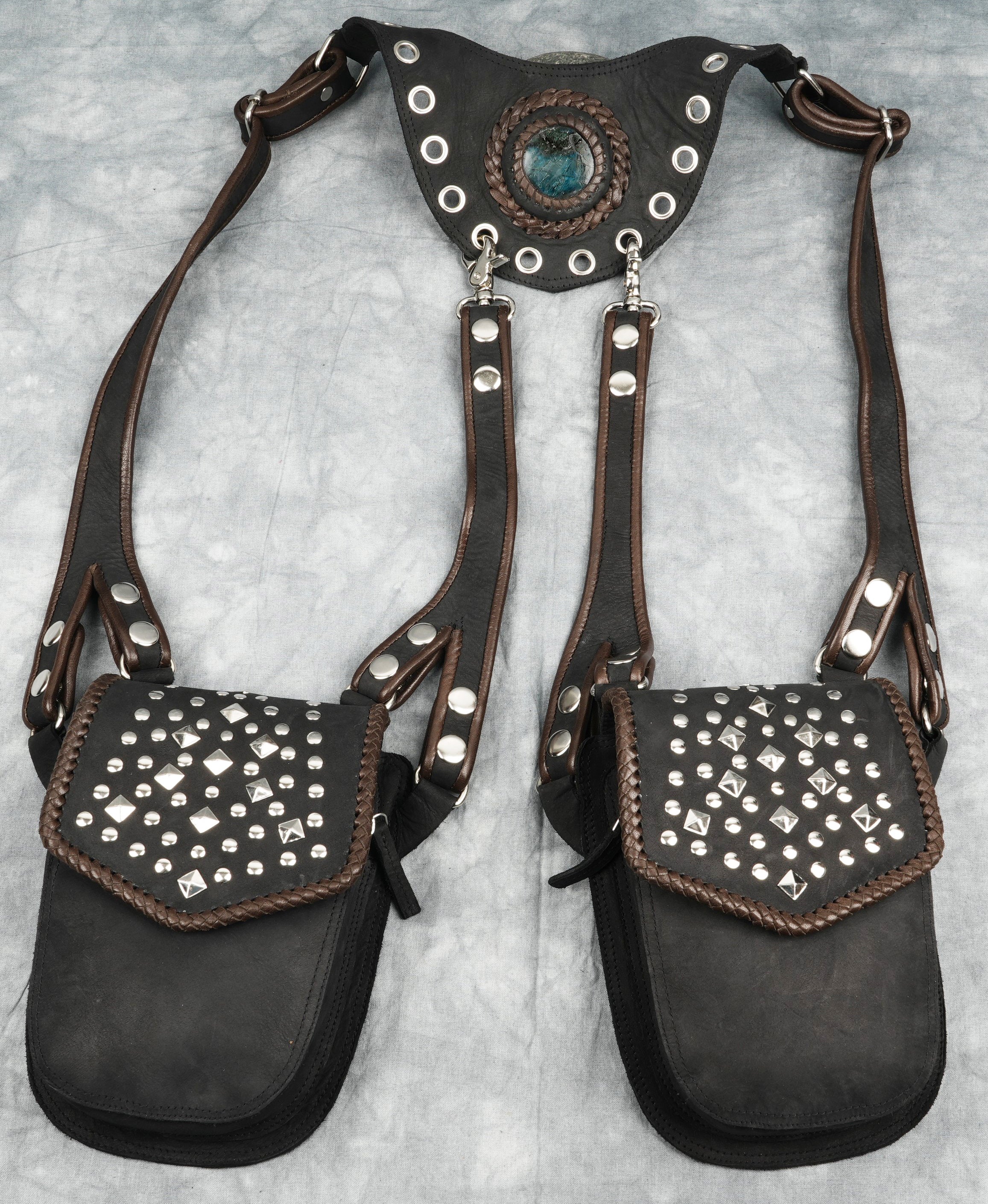 Features two roomy compartments to safely carry your essentials such as phone, wallet, or keys.