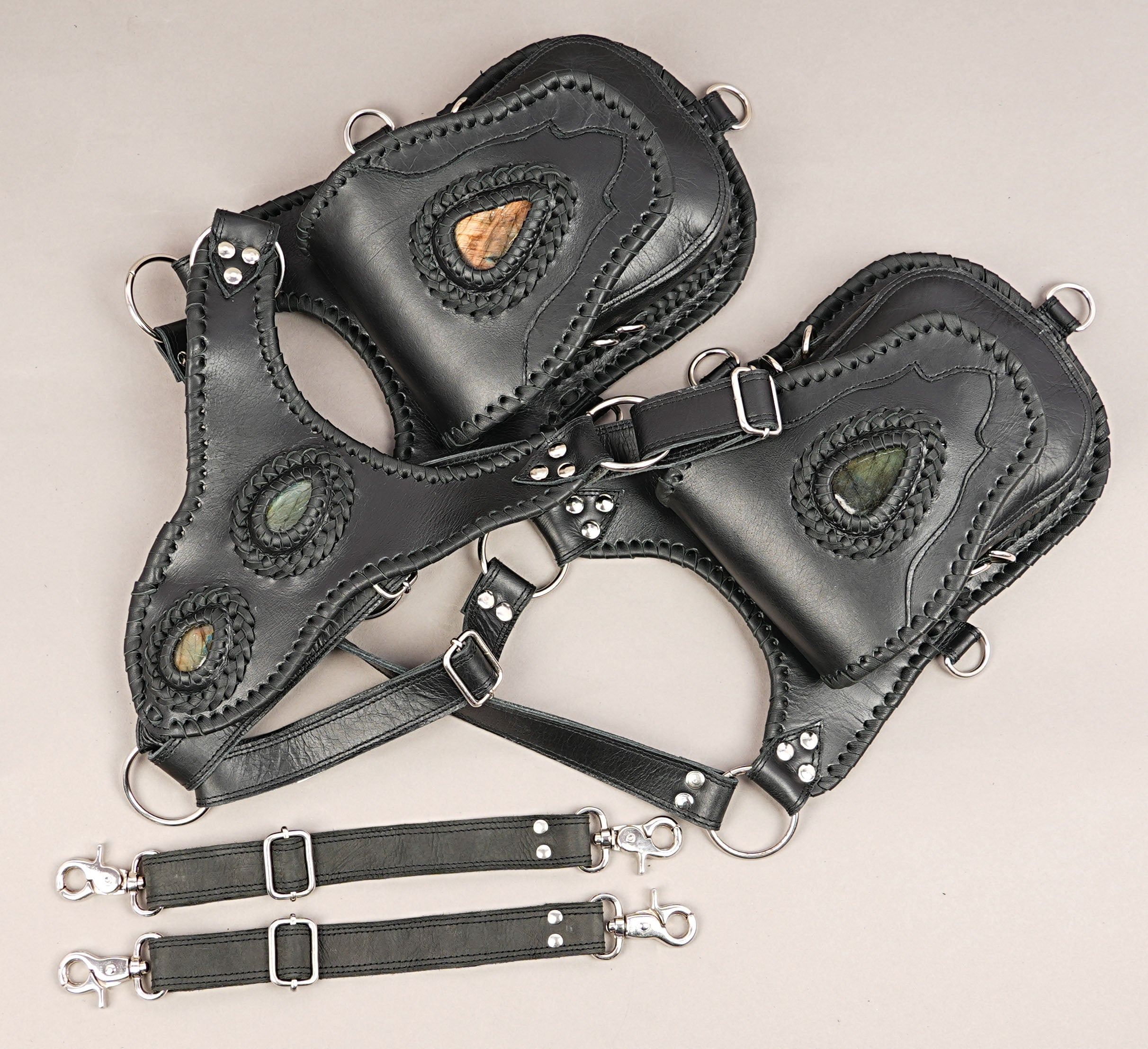 Black utility holster with gemstone inlay and adjustable straps