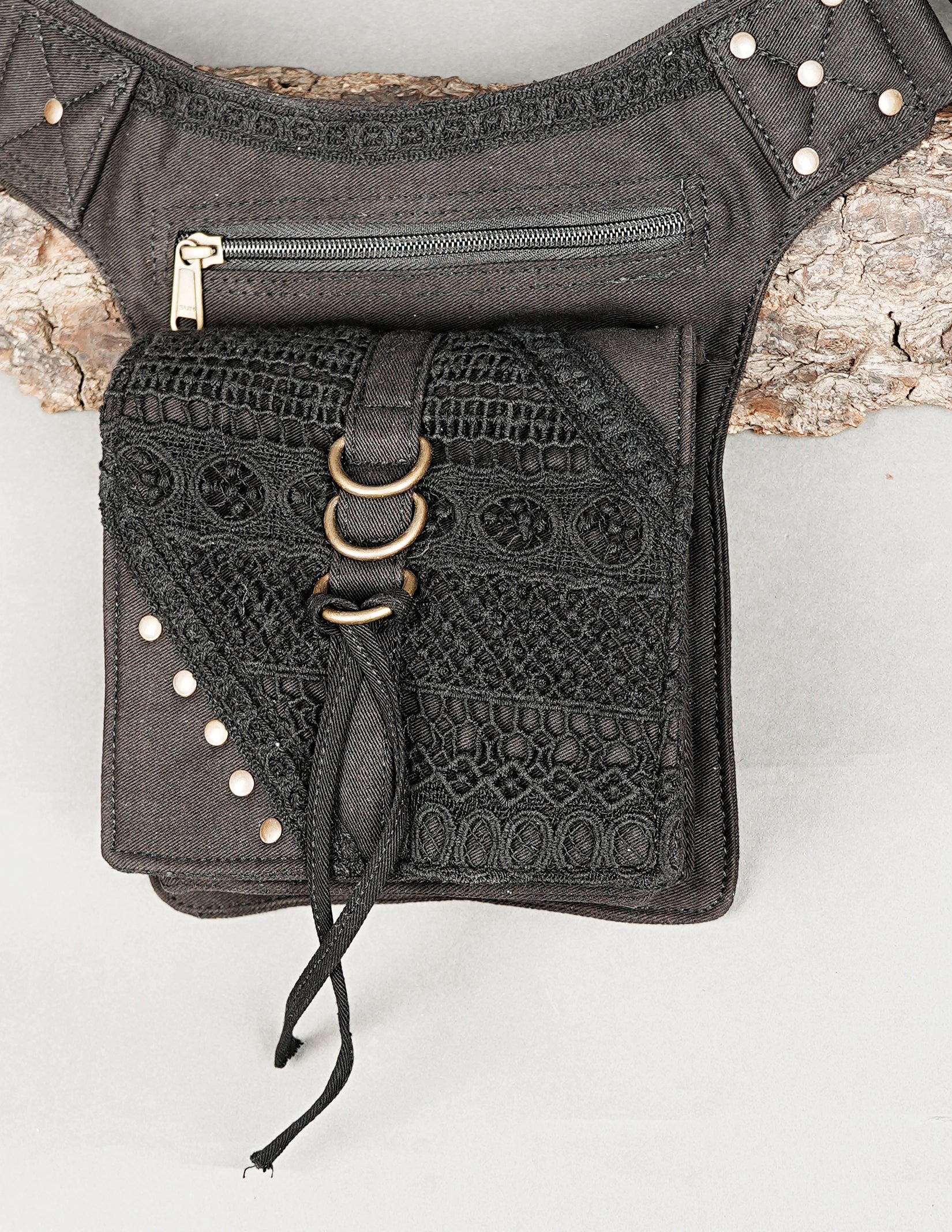 Festival hip bag featuring drawstring and brass D-rings