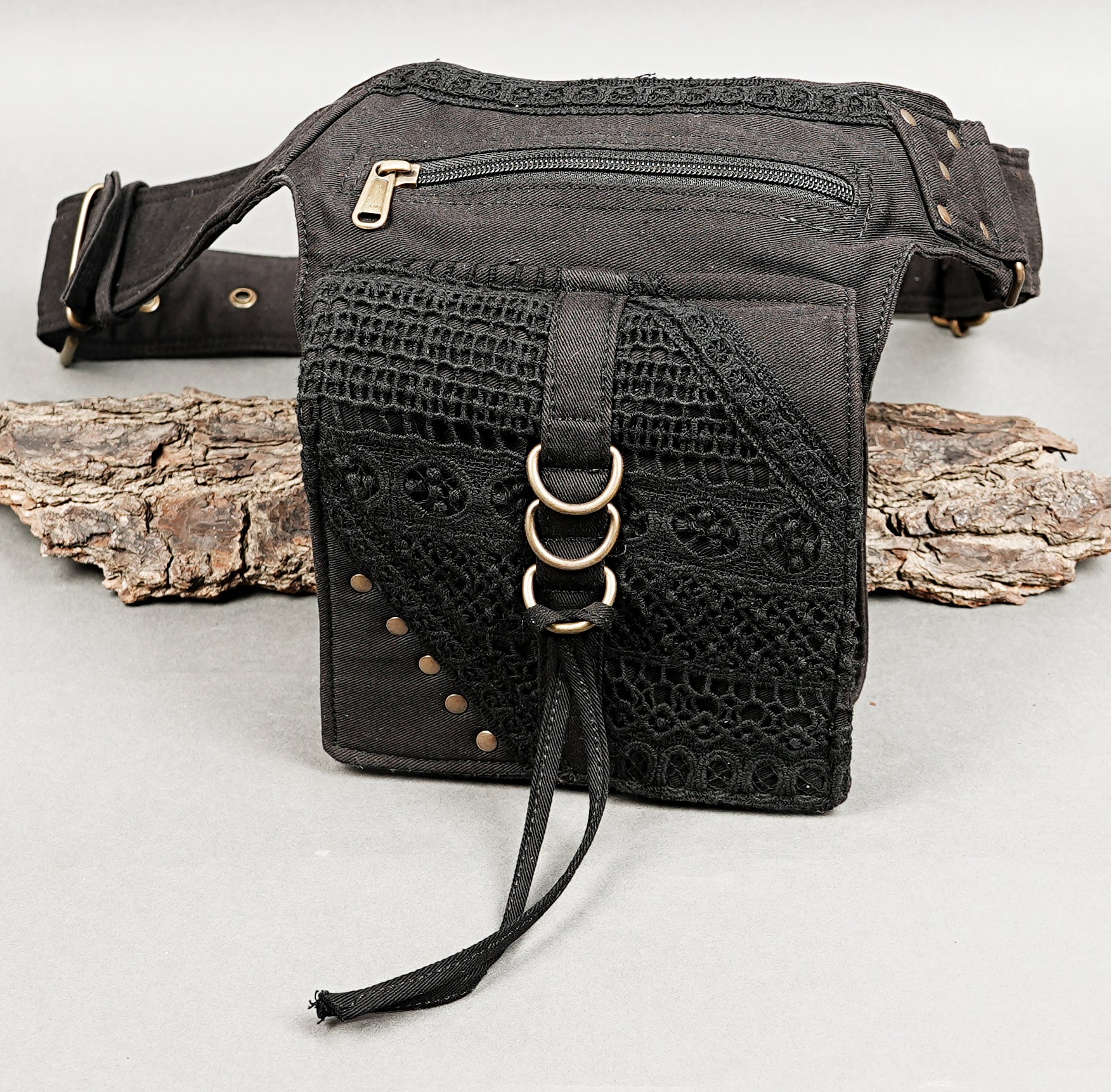 Adjustable boho waist bag with studded pocket flap