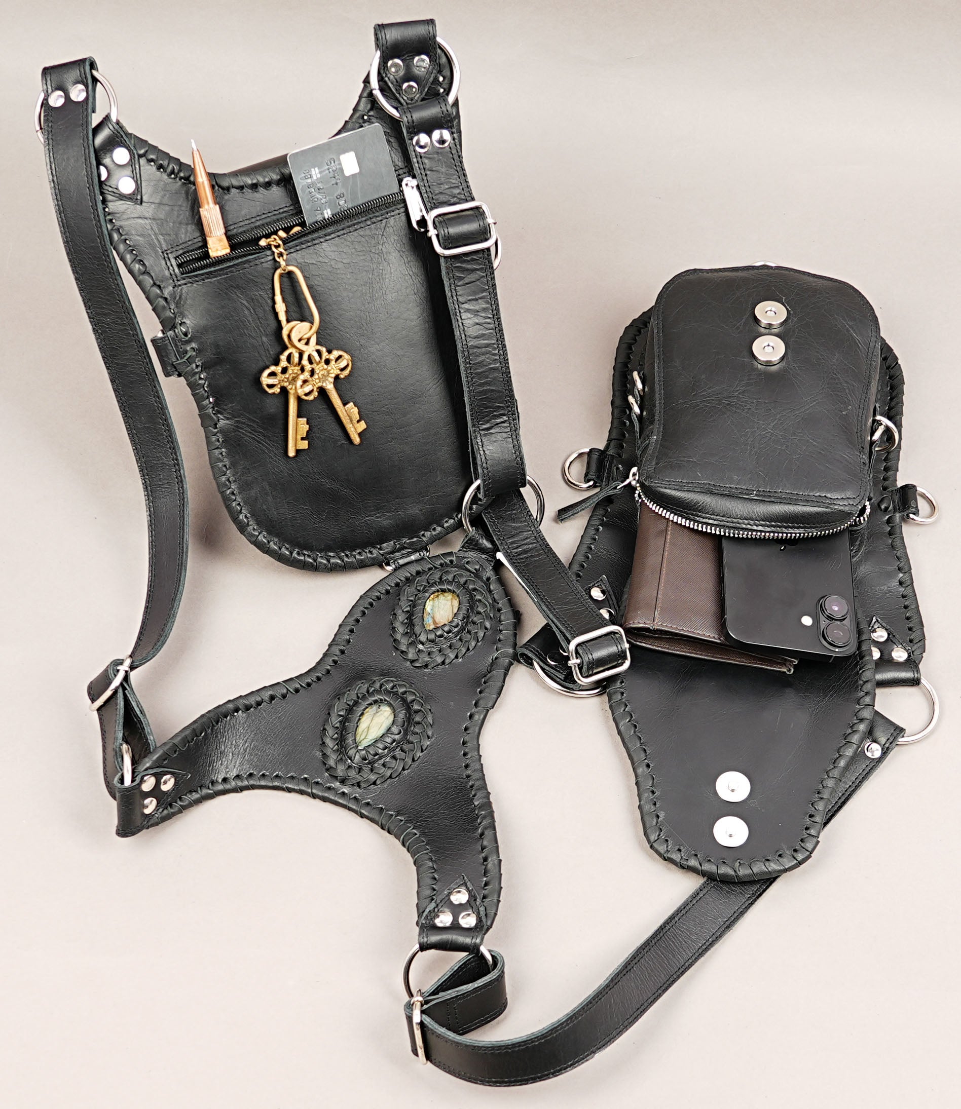 Black leather harness holster with decorative gemstone panel